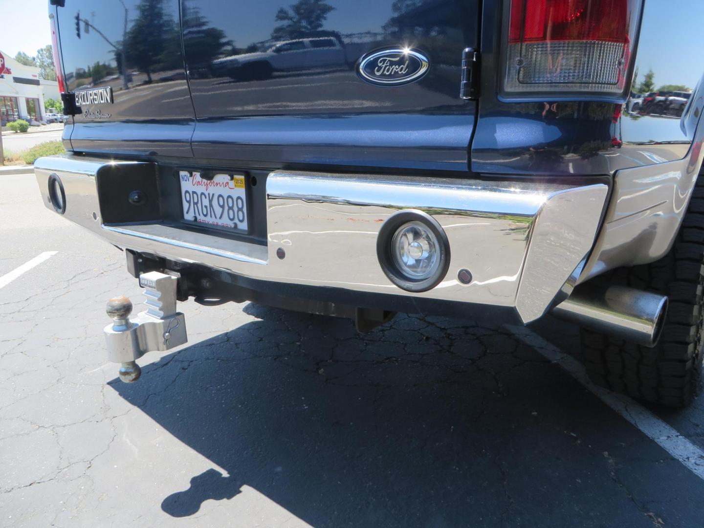 2003 Blue Ford Excursion Eddie Bauer 6.0L 4WD (1FMSU45PX3E) with an 6.0L V8 OHV 32V TURBO DIESEL engine, 5-Speed Automatic Overdrive transmission, located at 2630 Grass Valley Highway, Auburn, CA, 95603, (530) 508-5100, 38.937893, -121.095482 - Rare to find an Excursion especially like this... Extremely Clean 6.0L with ARP head studs, aluminum radiator, Lifted, Fuel wheels, Open Range AT tires, Bilstein Shocks, Amp power steps, Custom front and rear bumpers, 15K Warn Winch, Piaa Lights, RV Towable, Brake Controller, Edge Tuner CA legal, Ex - Photo#19