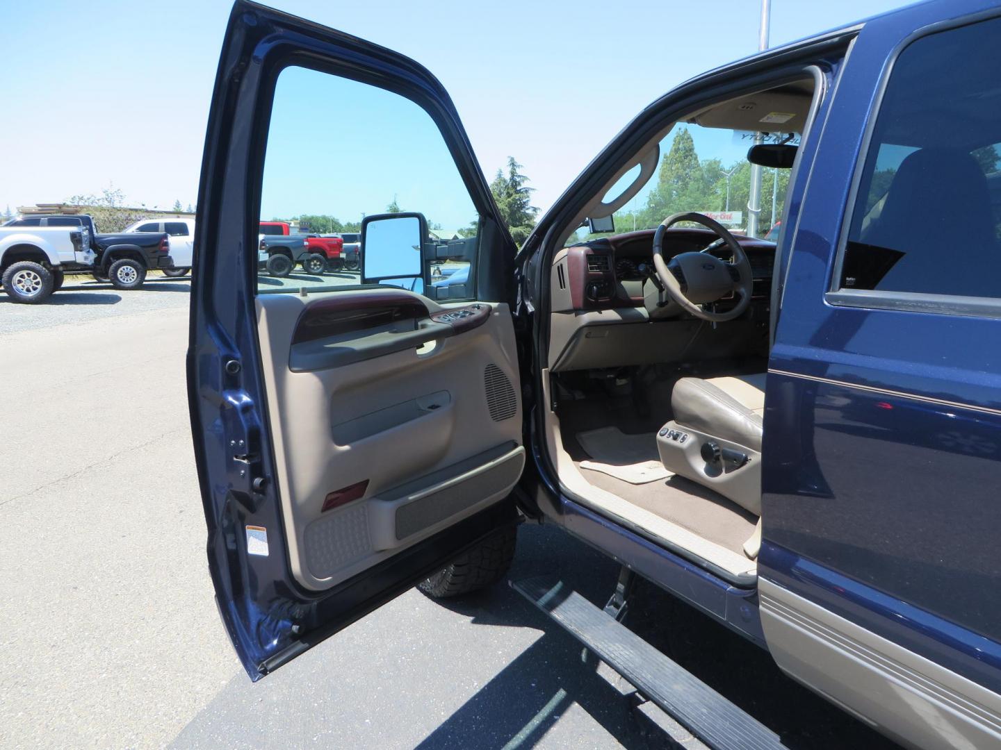 2003 Blue Ford Excursion Eddie Bauer 6.0L 4WD (1FMSU45PX3E) with an 6.0L V8 OHV 32V TURBO DIESEL engine, 5-Speed Automatic Overdrive transmission, located at 2630 Grass Valley Highway, Auburn, CA, 95603, (530) 508-5100, 38.937893, -121.095482 - Rare to find an Excursion especially like this... Extremely Clean 6.0L with ARP head studs, aluminum radiator, Lifted, Fuel wheels, Open Range AT tires, Bilstein Shocks, Amp power steps, Custom front and rear bumpers, 15K Warn Winch, Piaa Lights, RV Towable, Brake Controller, Edge Tuner CA legal, Ex - Photo#23