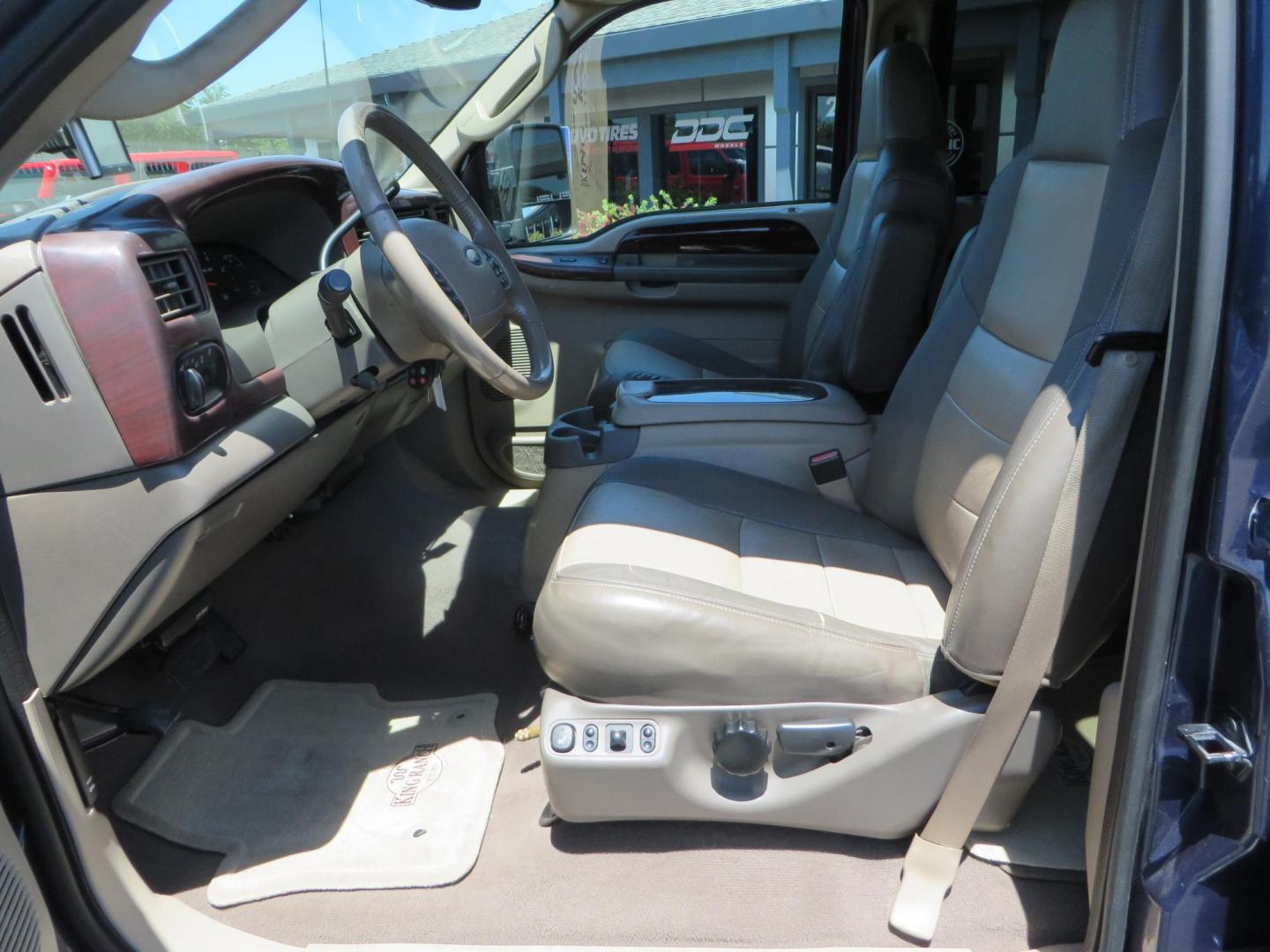 2003 Blue Ford Excursion Eddie Bauer 6.0L 4WD (1FMSU45PX3E) with an 6.0L V8 OHV 32V TURBO DIESEL engine, 5-Speed Automatic Overdrive transmission, located at 2630 Grass Valley Highway, Auburn, CA, 95603, (530) 508-5100, 38.937893, -121.095482 - Rare to find an Excursion especially like this... Extremely Clean 6.0L with ARP head studs, aluminum radiator, Lifted, Fuel wheels, Open Range AT tires, Bilstein Shocks, Amp power steps, Custom front and rear bumpers, 15K Warn Winch, Piaa Lights, RV Towable, Brake Controller, Edge Tuner CA legal, Ex - Photo#27