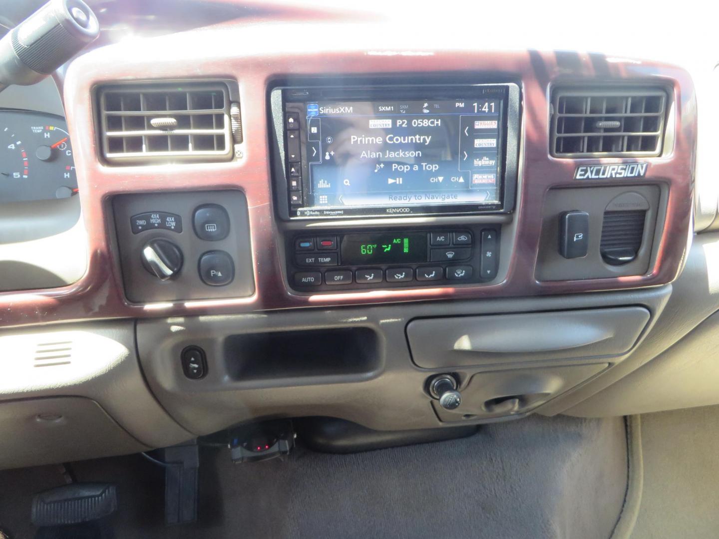 2003 Blue Ford Excursion Eddie Bauer 6.0L 4WD (1FMSU45PX3E) with an 6.0L V8 OHV 32V TURBO DIESEL engine, 5-Speed Automatic Overdrive transmission, located at 2630 Grass Valley Highway, Auburn, CA, 95603, (530) 508-5100, 38.937893, -121.095482 - Rare to find an Excursion especially like this... Extremely Clean 6.0L with ARP head studs, aluminum radiator, Lifted, Fuel wheels, Open Range AT tires, Bilstein Shocks, Amp power steps, Custom front and rear bumpers, 15K Warn Winch, Piaa Lights, RV Towable, Brake Controller, Edge Tuner CA legal, Ex - Photo#34