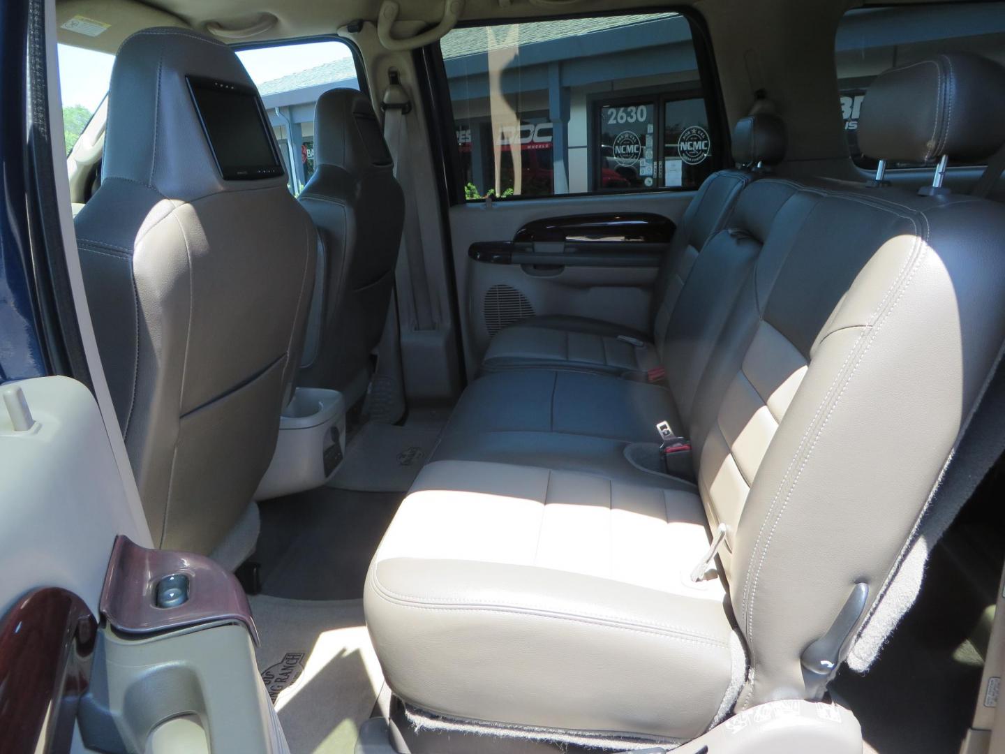 2003 Blue Ford Excursion Eddie Bauer 6.0L 4WD (1FMSU45PX3E) with an 6.0L V8 OHV 32V TURBO DIESEL engine, 5-Speed Automatic Overdrive transmission, located at 2630 Grass Valley Highway, Auburn, CA, 95603, (530) 508-5100, 38.937893, -121.095482 - Rare to find an Excursion especially like this... Extremely Clean 6.0L with ARP head studs, aluminum radiator, Lifted, Fuel wheels, Open Range AT tires, Bilstein Shocks, Amp power steps, Custom front and rear bumpers, 15K Warn Winch, Piaa Lights, RV Towable, Brake Controller, Edge Tuner CA legal, Ex - Photo#50