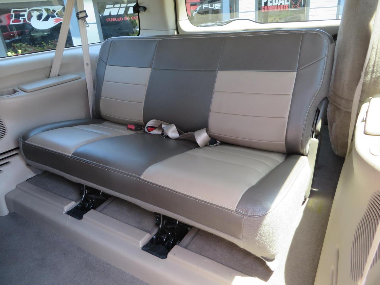 2003 Blue Ford Excursion Eddie Bauer 6.0L 4WD (1FMSU45PX3E) with an 6.0L V8 OHV 32V TURBO DIESEL engine, 5-Speed Automatic Overdrive transmission, located at 2630 Grass Valley Highway, Auburn, CA, 95603, (530) 508-5100, 38.937893, -121.095482 - Rare to find an Excursion especially like this... Extremely Clean 6.0L with ARP head studs, aluminum radiator, Lifted, Fuel wheels, Open Range AT tires, Bilstein Shocks, Amp power steps, Custom front and rear bumpers, 15K Warn Winch, Piaa Lights, RV Towable, Brake Controller, Edge Tuner CA legal, Ex - Photo#57