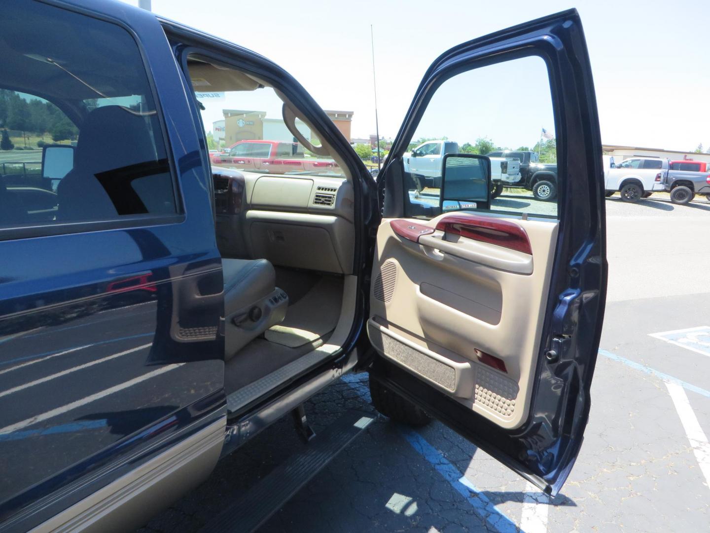 2003 Blue Ford Excursion Eddie Bauer 6.0L 4WD (1FMSU45PX3E) with an 6.0L V8 OHV 32V TURBO DIESEL engine, 5-Speed Automatic Overdrive transmission, located at 2630 Grass Valley Highway, Auburn, CA, 95603, (530) 508-5100, 38.937893, -121.095482 - Rare to find an Excursion especially like this... Extremely Clean 6.0L with ARP head studs, aluminum radiator, Lifted, Fuel wheels, Open Range AT tires, Bilstein Shocks, Amp power steps, Custom front and rear bumpers, 15K Warn Winch, Piaa Lights, RV Towable, Brake Controller, Edge Tuner CA legal, Ex - Photo#58