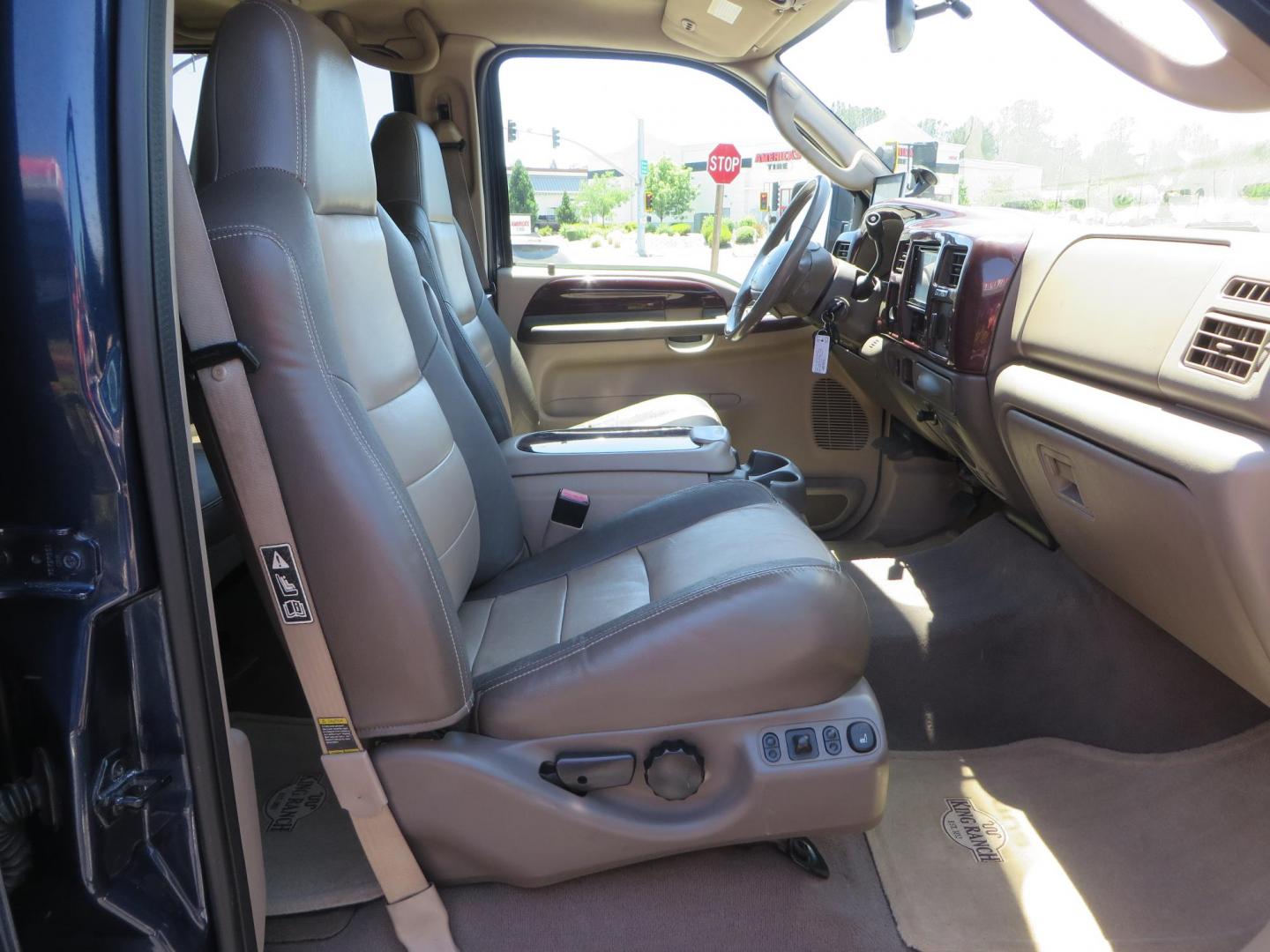 2003 Blue Ford Excursion Eddie Bauer 6.0L 4WD (1FMSU45PX3E) with an 6.0L V8 OHV 32V TURBO DIESEL engine, 5-Speed Automatic Overdrive transmission, located at 2630 Grass Valley Highway, Auburn, CA, 95603, (530) 508-5100, 38.937893, -121.095482 - Rare to find an Excursion especially like this... Extremely Clean 6.0L with ARP head studs, aluminum radiator, Lifted, Fuel wheels, Open Range AT tires, Bilstein Shocks, Amp power steps, Custom front and rear bumpers, 15K Warn Winch, Piaa Lights, RV Towable, Brake Controller, Edge Tuner CA legal, Ex - Photo#61