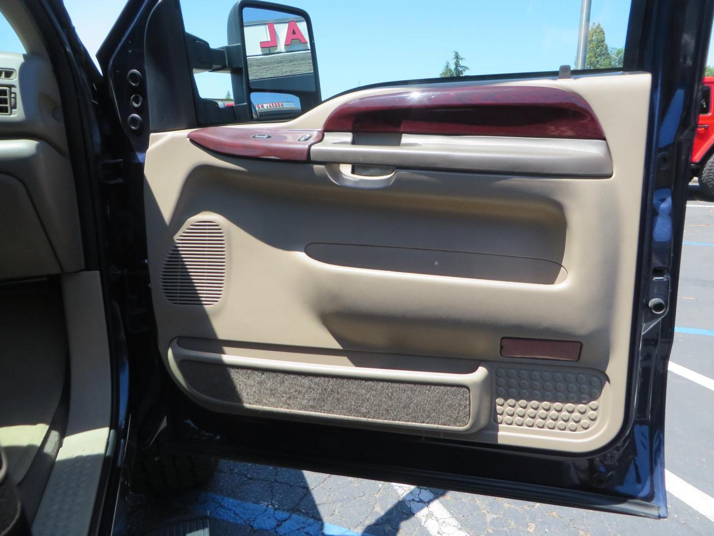 2003 Blue Ford Excursion Eddie Bauer 6.0L 4WD (1FMSU45PX3E) with an 6.0L V8 OHV 32V TURBO DIESEL engine, 5-Speed Automatic Overdrive transmission, located at 2630 Grass Valley Highway, Auburn, CA, 95603, (530) 508-5100, 38.937893, -121.095482 - Rare to find an Excursion especially like this... Extremely Clean 6.0L with ARP head studs, aluminum radiator, Lifted, Fuel wheels, Open Range AT tires, Bilstein Shocks, Amp power steps, Custom front and rear bumpers, 15K Warn Winch, Piaa Lights, RV Towable, Brake Controller, Edge Tuner CA legal, Ex - Photo#59