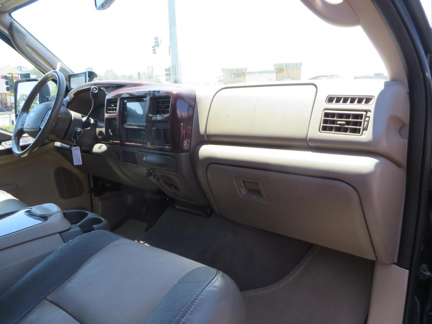 2003 Blue Ford Excursion Eddie Bauer 6.0L 4WD (1FMSU45PX3E) with an 6.0L V8 OHV 32V TURBO DIESEL engine, 5-Speed Automatic Overdrive transmission, located at 2630 Grass Valley Highway, Auburn, CA, 95603, (530) 508-5100, 38.937893, -121.095482 - Rare to find an Excursion especially like this... Extremely Clean 6.0L with ARP head studs, aluminum radiator, Lifted, Fuel wheels, Open Range AT tires, Bilstein Shocks, Amp power steps, Custom front and rear bumpers, 15K Warn Winch, Piaa Lights, RV Towable, Brake Controller, Edge Tuner CA legal, Ex - Photo#64