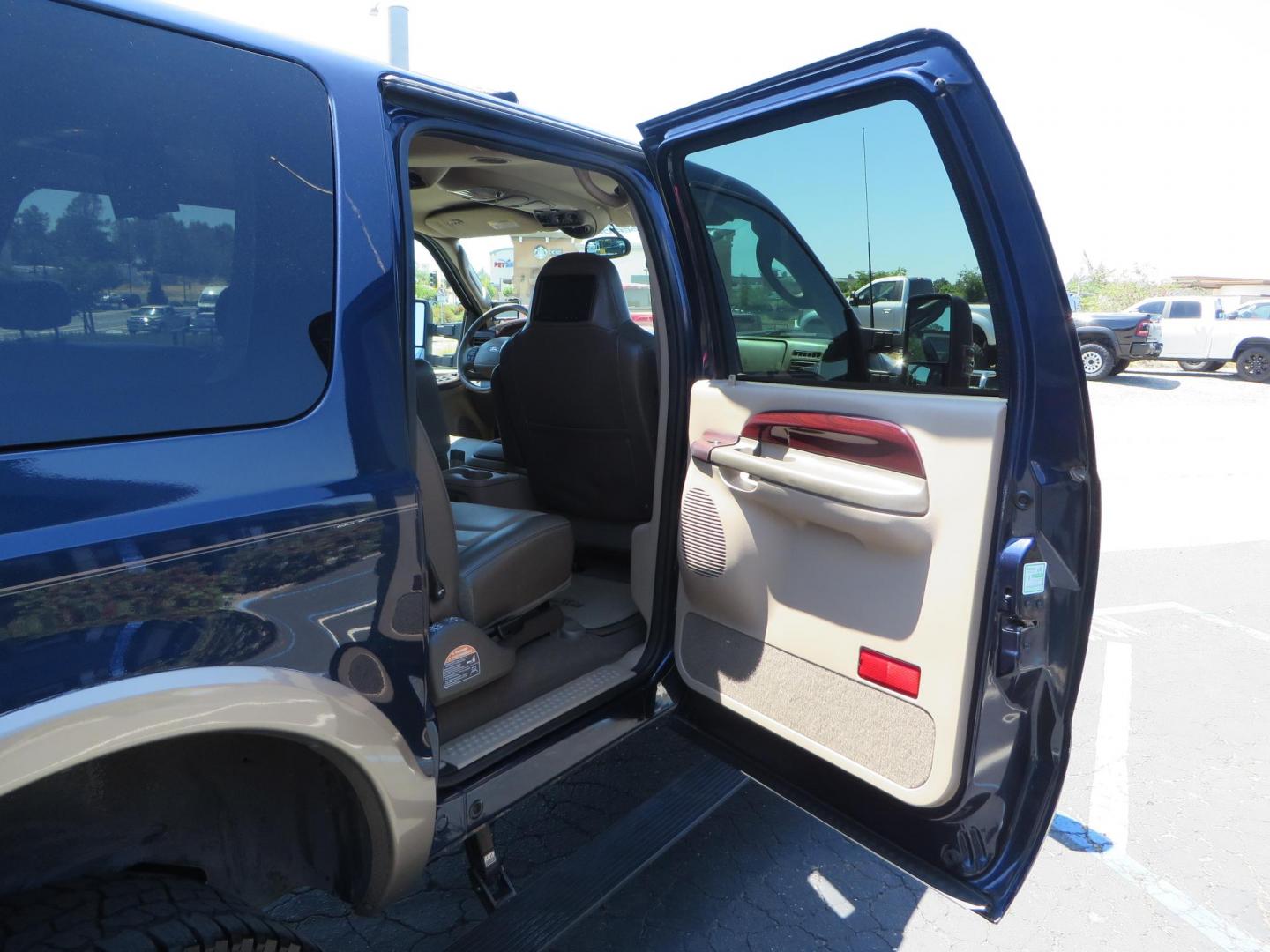 2003 Blue Ford Excursion Eddie Bauer 6.0L 4WD (1FMSU45PX3E) with an 6.0L V8 OHV 32V TURBO DIESEL engine, 5-Speed Automatic Overdrive transmission, located at 2630 Grass Valley Highway, Auburn, CA, 95603, (530) 508-5100, 38.937893, -121.095482 - Rare to find an Excursion especially like this... Extremely Clean 6.0L with ARP head studs, aluminum radiator, Lifted, Fuel wheels, Open Range AT tires, Bilstein Shocks, Amp power steps, Custom front and rear bumpers, 15K Warn Winch, Piaa Lights, RV Towable, Brake Controller, Edge Tuner CA legal, Ex - Photo#65