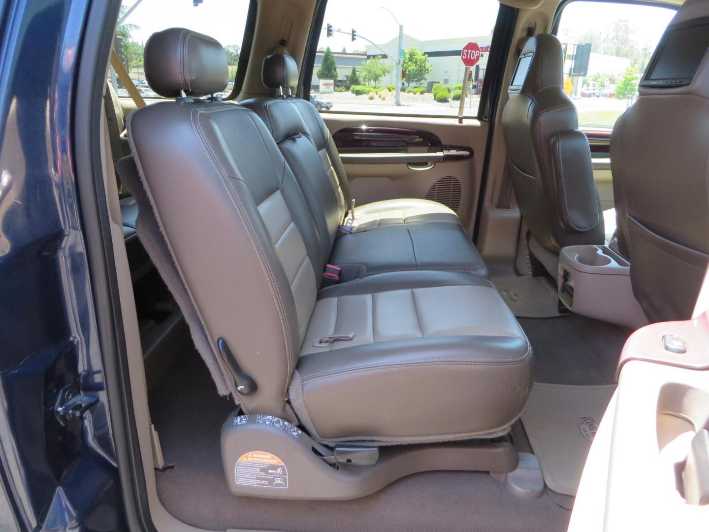 2003 Blue Ford Excursion Eddie Bauer 6.0L 4WD (1FMSU45PX3E) with an 6.0L V8 OHV 32V TURBO DIESEL engine, 5-Speed Automatic Overdrive transmission, located at 2630 Grass Valley Highway, Auburn, CA, 95603, (530) 508-5100, 38.937893, -121.095482 - Rare to find an Excursion especially like this... Extremely Clean 6.0L with ARP head studs, aluminum radiator, Lifted, Fuel wheels, Open Range AT tires, Bilstein Shocks, Amp power steps, Custom front and rear bumpers, 15K Warn Winch, Piaa Lights, RV Towable, Brake Controller, Edge Tuner CA legal, Ex - Photo#68