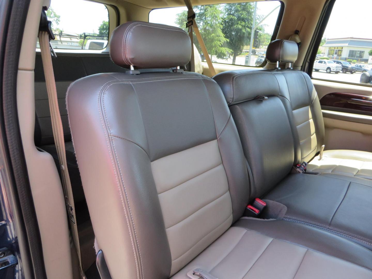 2003 Blue Ford Excursion Eddie Bauer 6.0L 4WD (1FMSU45PX3E) with an 6.0L V8 OHV 32V TURBO DIESEL engine, 5-Speed Automatic Overdrive transmission, located at 2630 Grass Valley Highway, Auburn, CA, 95603, (530) 508-5100, 38.937893, -121.095482 - Rare to find an Excursion especially like this... Extremely Clean 6.0L with ARP head studs, aluminum radiator, Lifted, Fuel wheels, Open Range AT tires, Bilstein Shocks, Amp power steps, Custom front and rear bumpers, 15K Warn Winch, Piaa Lights, RV Towable, Brake Controller, Edge Tuner CA legal, Ex - Photo#69