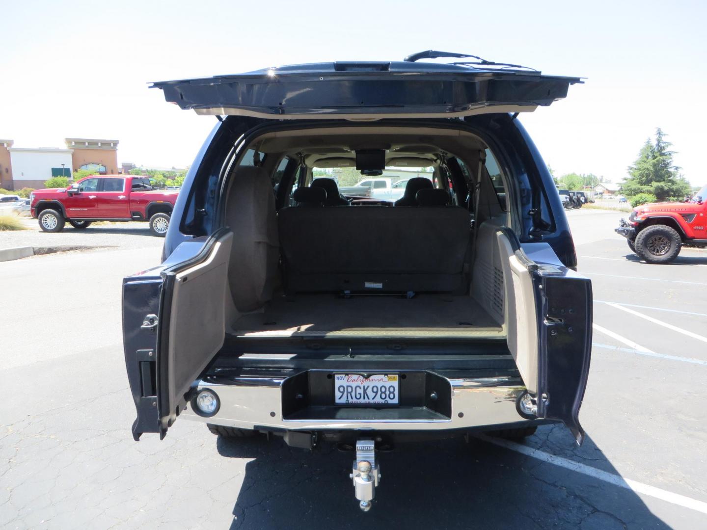 2003 Blue Ford Excursion Eddie Bauer 6.0L 4WD (1FMSU45PX3E) with an 6.0L V8 OHV 32V TURBO DIESEL engine, 5-Speed Automatic Overdrive transmission, located at 2630 Grass Valley Highway, Auburn, CA, 95603, (530) 508-5100, 38.937893, -121.095482 - Rare to find an Excursion especially like this... Extremely Clean 6.0L with ARP head studs, aluminum radiator, Lifted, Fuel wheels, Open Range AT tires, Bilstein Shocks, Amp power steps, Custom front and rear bumpers, 15K Warn Winch, Piaa Lights, RV Towable, Brake Controller, Edge Tuner CA legal, Ex - Photo#75