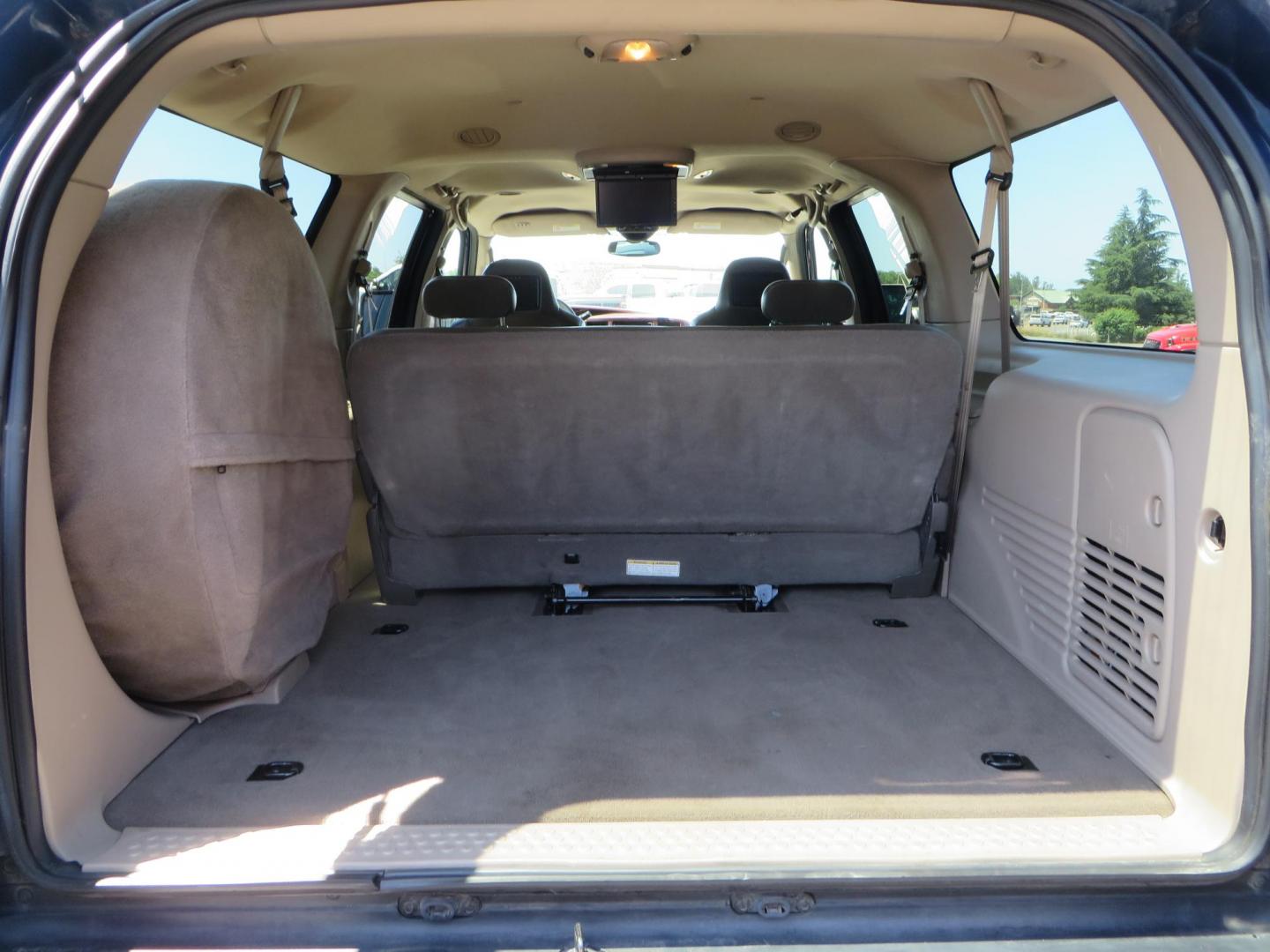 2003 Blue Ford Excursion Eddie Bauer 6.0L 4WD (1FMSU45PX3E) with an 6.0L V8 OHV 32V TURBO DIESEL engine, 5-Speed Automatic Overdrive transmission, located at 2630 Grass Valley Highway, Auburn, CA, 95603, (530) 508-5100, 38.937893, -121.095482 - Rare to find an Excursion especially like this... Extremely Clean 6.0L with ARP head studs, aluminum radiator, Lifted, Fuel wheels, Open Range AT tires, Bilstein Shocks, Amp power steps, Custom front and rear bumpers, 15K Warn Winch, Piaa Lights, RV Towable, Brake Controller, Edge Tuner CA legal, Ex - Photo#76