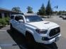 2021 White Toyota Tacoma SR5 Double Cab V6 6AT 4WD (3TMCZ5AN1MM) with an 3.5L V6 DOHC 24V engine, 6A transmission, located at 2630 Grass Valley Highway, Auburn, CA, 95603, (530) 508-5100, 38.937893, -121.095482 - Icon Vehicle Dynamics remote reservoir coilovers & shocks, Icon Upper control arms, 1552 wheels, Toyo AT3 tires, Rock Sliders, Victory 4x4 roof and camper shell rack, Leer Camper shell, Banks Idash. - Photo#4