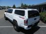 2021 White Toyota Tacoma SR5 Double Cab V6 6AT 4WD (3TMCZ5AN1MM) with an 3.5L V6 DOHC 24V engine, 6A transmission, located at 2630 Grass Valley Highway, Auburn, CA, 95603, (530) 508-5100, 38.937893, -121.095482 - Icon Vehicle Dynamics remote reservoir coilovers & shocks, Icon Upper control arms, 1552 wheels, Toyo AT3 tires, Rock Sliders, Victory 4x4 roof and camper shell rack, Leer Camper shell, Banks Idash. - Photo#12