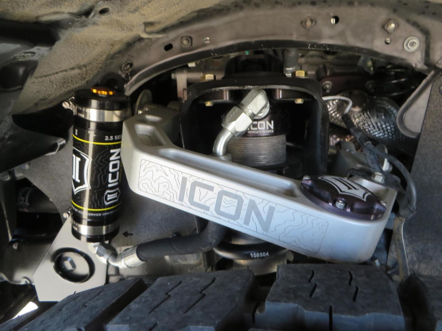 2021 White Toyota Tacoma SR5 Double Cab V6 6AT 4WD (3TMCZ5AN1MM) with an 3.5L V6 DOHC 24V engine, 6A transmission, located at 2630 Grass Valley Highway, Auburn, CA, 95603, (530) 508-5100, 38.937893, -121.095482 - Icon Vehicle Dynamics remote reservoir coilovers & shocks, Icon Upper control arms, 1552 wheels, Toyo AT3 tires, Rock Sliders, Victory 4x4 roof and camper shell rack, Leer Camper shell, Banks Idash. - Photo#19