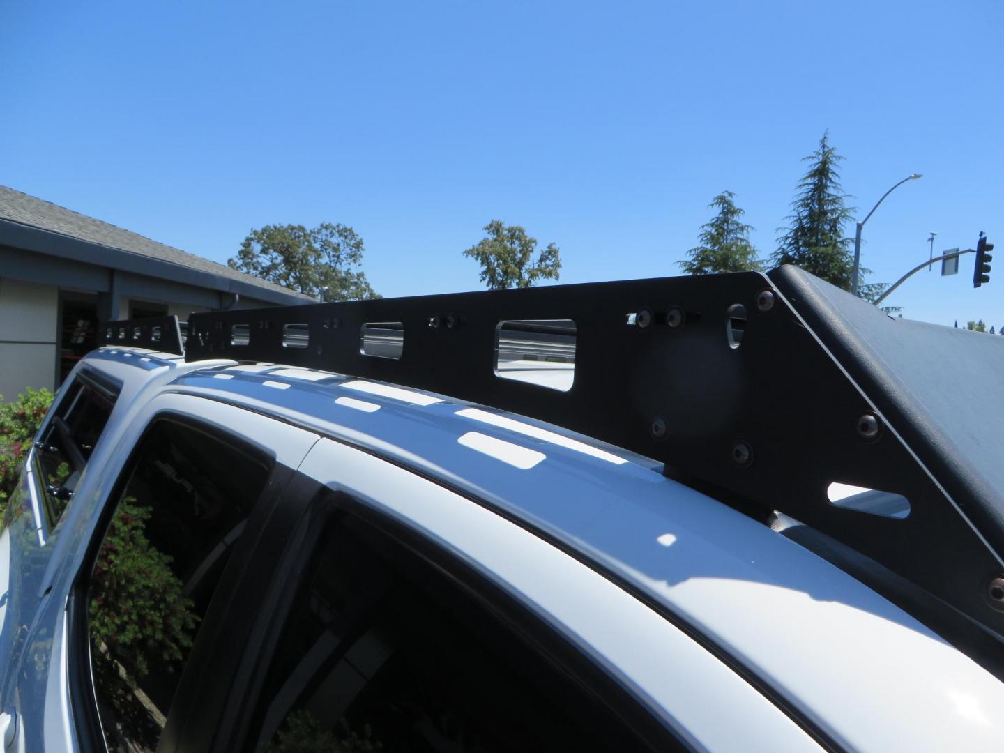 2021 White Toyota Tacoma SR5 Double Cab V6 6AT 4WD (3TMCZ5AN1MM) with an 3.5L V6 DOHC 24V engine, 6A transmission, located at 2630 Grass Valley Highway, Auburn, CA, 95603, (530) 508-5100, 38.937893, -121.095482 - Icon Vehicle Dynamics remote reservoir coilovers & shocks, Icon Upper control arms, 1552 wheels, Toyo AT3 tires, Rock Sliders, Victory 4x4 roof and camper shell rack, Leer Camper shell, Banks Idash. - Photo#27