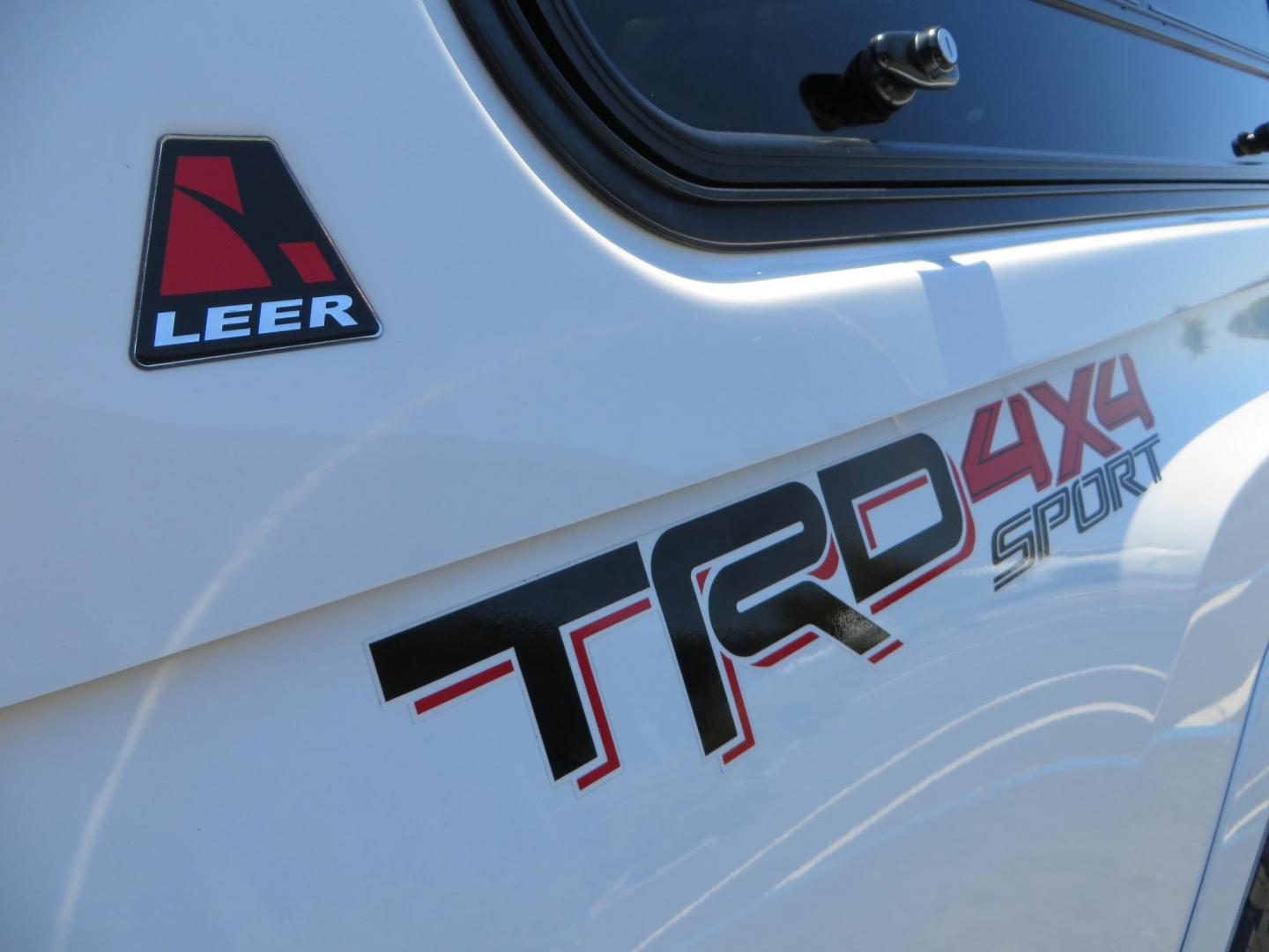 2021 White Toyota Tacoma SR5 Double Cab V6 6AT 4WD (3TMCZ5AN1MM) with an 3.5L V6 DOHC 24V engine, 6A transmission, located at 2630 Grass Valley Highway, Auburn, CA, 95603, (530) 508-5100, 38.937893, -121.095482 - Icon Vehicle Dynamics remote reservoir coilovers & shocks, Icon Upper control arms, 1552 wheels, Toyo AT3 tires, Rock Sliders, Victory 4x4 roof and camper shell rack, Leer Camper shell, Banks Idash. - Photo#30