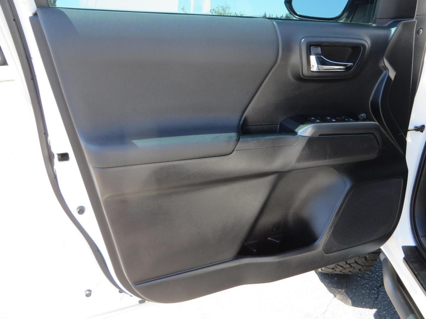 2021 White Toyota Tacoma SR5 Double Cab V6 6AT 4WD (3TMCZ5AN1MM) with an 3.5L V6 DOHC 24V engine, 6A transmission, located at 2630 Grass Valley Highway, Auburn, CA, 95603, (530) 508-5100, 38.937893, -121.095482 - Icon Vehicle Dynamics remote reservoir coilovers & shocks, Icon Upper control arms, 1552 wheels, Toyo AT3 tires, Rock Sliders, Victory 4x4 roof and camper shell rack, Leer Camper shell, Banks Idash. - Photo#40