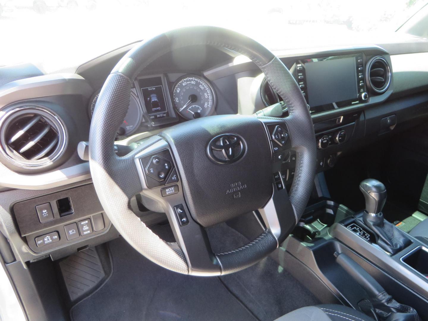 2021 White Toyota Tacoma SR5 Double Cab V6 6AT 4WD (3TMCZ5AN1MM) with an 3.5L V6 DOHC 24V engine, 6A transmission, located at 2630 Grass Valley Highway, Auburn, CA, 95603, (530) 508-5100, 38.937893, -121.095482 - Icon Vehicle Dynamics remote reservoir coilovers & shocks, Icon Upper control arms, 1552 wheels, Toyo AT3 tires, Rock Sliders, Victory 4x4 roof and camper shell rack, Leer Camper shell, Banks Idash. - Photo#41