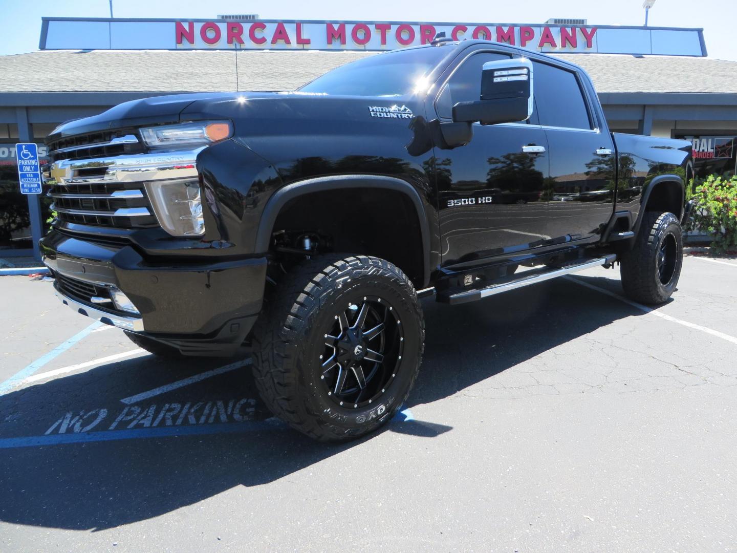 2022 BLACK Chevrolet Silverado 3500HD High Country Crew Cab 4WD (2GC4YVEY4N1) with an 6.6L V8 OHV 32V TURBO DIESEL engine, 6A transmission, located at 2630 Grass Valley Highway, Auburn, CA, 95603, (530) 508-5100, 38.937893, -121.095482 - Photo#0