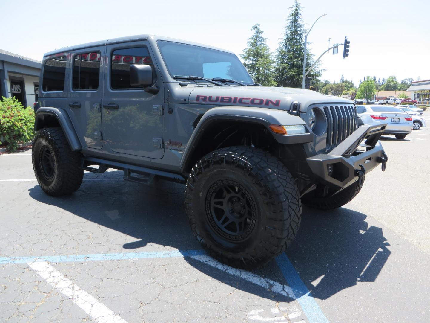 2023 Gray /Black Jeep Wrangler Unlimited Rubicon (1C4HJXFG8PW) with an 3.6L V6 DOHC 24V FFV engine, 6A transmission, located at 2630 Grass Valley Highway, Auburn, CA, 95603, (530) 508-5100, 38.937893, -121.095482 - Features a 3.5" JKS suspension system, Fox shocks, 17" Method Race wheels, 37" Nitto Ridge Grappler tires, N-Fab EPYX running boards, Teraflex HD tire carrier, RC front & rear bumpers with led lights, and window tint. - Photo#2