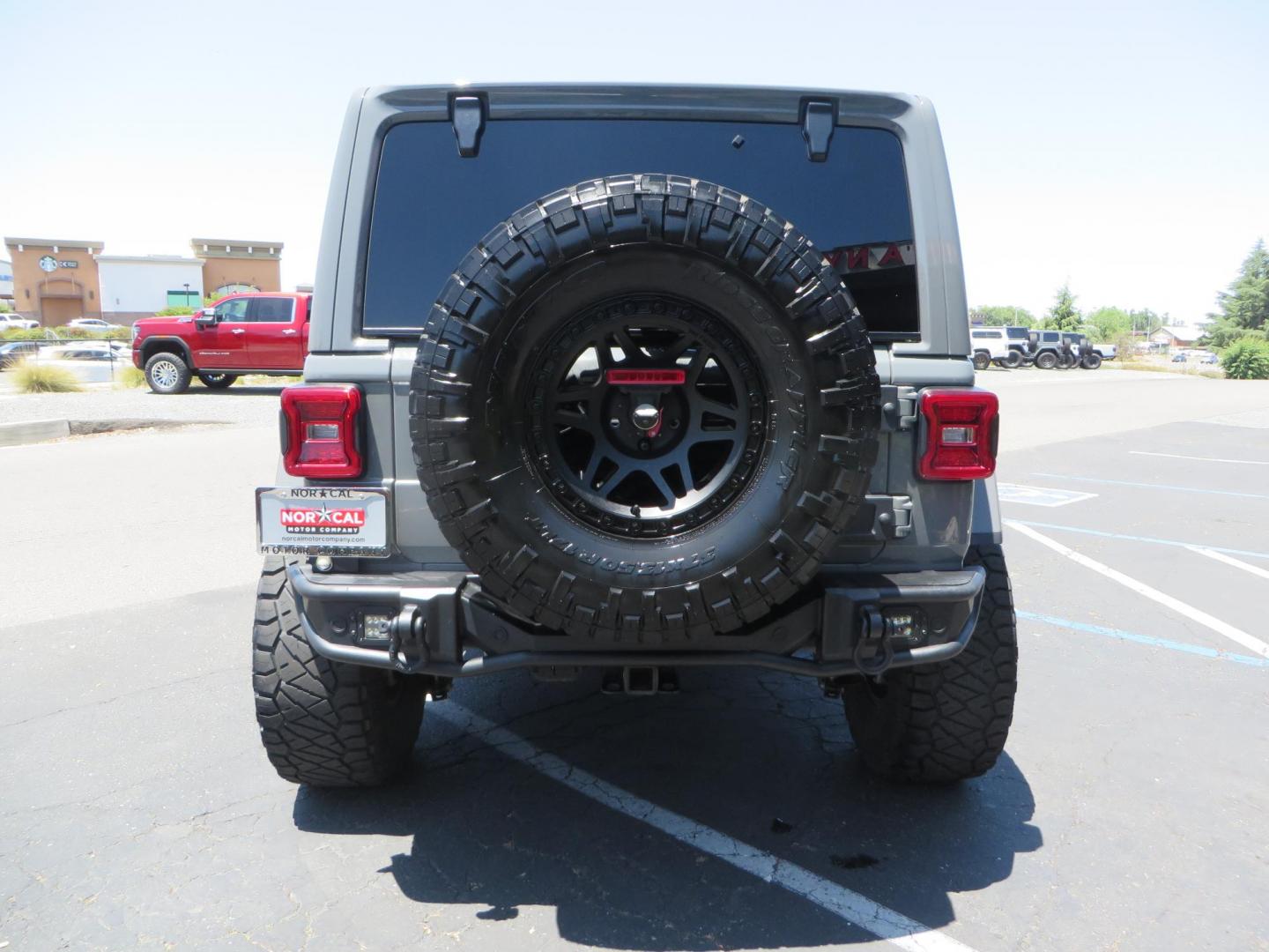 2023 Gray /Black Jeep Wrangler Unlimited Rubicon (1C4HJXFG8PW) with an 3.6L V6 DOHC 24V FFV engine, 6A transmission, located at 2630 Grass Valley Highway, Auburn, CA, 95603, (530) 508-5100, 38.937893, -121.095482 - Features a 3.5" JKS suspension system, Fox shocks, 17" Method Race wheels, 37" Nitto Ridge Grappler tires, N-Fab EPYX running boards, Teraflex HD tire carrier, RC front & rear bumpers with led lights, and window tint. - Photo#5
