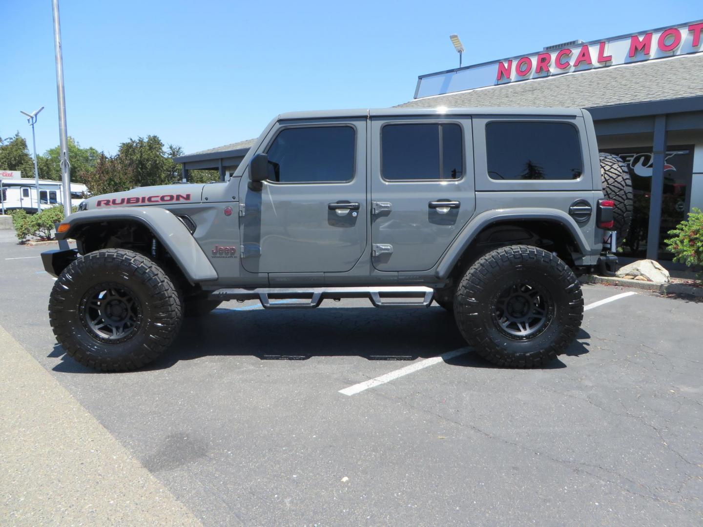 2023 Gray /Black Jeep Wrangler Unlimited Rubicon (1C4HJXFG8PW) with an 3.6L V6 DOHC 24V FFV engine, 6A transmission, located at 2630 Grass Valley Highway, Auburn, CA, 95603, (530) 508-5100, 38.937893, -121.095482 - Features a 3.5" JKS suspension system, Fox shocks, 17" Method Race wheels, 37" Nitto Ridge Grappler tires, N-Fab EPYX running boards, Teraflex HD tire carrier, RC front & rear bumpers with led lights, and window tint. - Photo#7