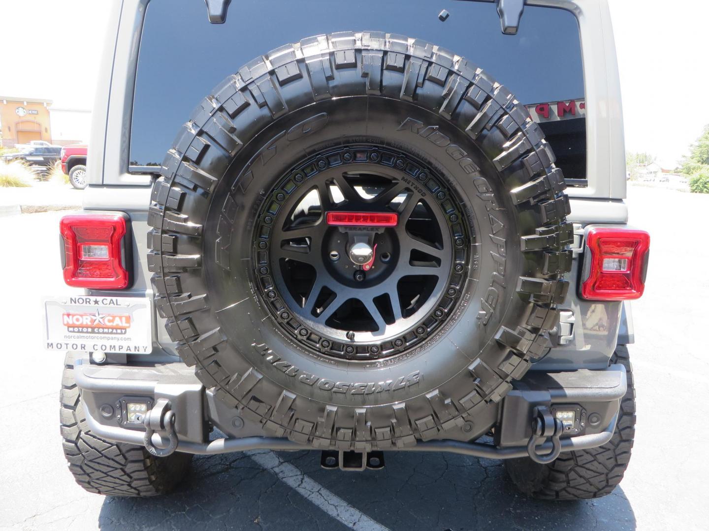 2023 Gray /Black Jeep Wrangler Unlimited Rubicon (1C4HJXFG8PW) with an 3.6L V6 DOHC 24V FFV engine, 6A transmission, located at 2630 Grass Valley Highway, Auburn, CA, 95603, (530) 508-5100, 38.937893, -121.095482 - Features a 3.5" JKS suspension system, Fox shocks, 17" Method Race wheels, 37" Nitto Ridge Grappler tires, N-Fab EPYX running boards, Teraflex HD tire carrier, RC front & rear bumpers with led lights, and window tint. - Photo#13