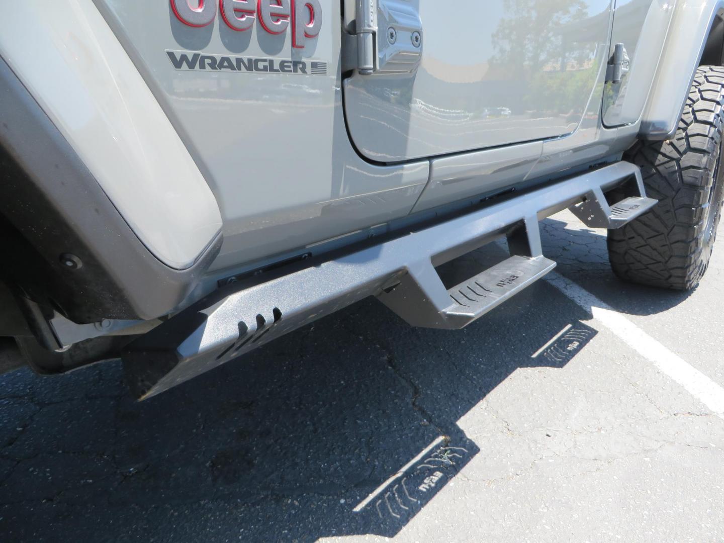 2023 Gray /Black Jeep Wrangler Unlimited Rubicon (1C4HJXFG8PW) with an 3.6L V6 DOHC 24V FFV engine, 6A transmission, located at 2630 Grass Valley Highway, Auburn, CA, 95603, (530) 508-5100, 38.937893, -121.095482 - Features a 3.5" JKS suspension system, Fox shocks, 17" Method Race wheels, 37" Nitto Ridge Grappler tires, N-Fab EPYX running boards, Teraflex HD tire carrier, RC front & rear bumpers with led lights, and window tint. - Photo#11