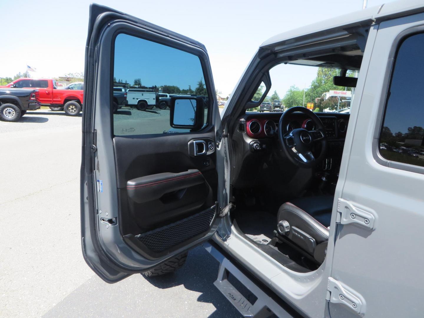 2023 Gray /Black Jeep Wrangler Unlimited Rubicon (1C4HJXFG8PW) with an 3.6L V6 DOHC 24V FFV engine, 6A transmission, located at 2630 Grass Valley Highway, Auburn, CA, 95603, (530) 508-5100, 38.937893, -121.095482 - Features a 3.5" JKS suspension system, Fox shocks, 17" Method Race wheels, 37" Nitto Ridge Grappler tires, N-Fab EPYX running boards, Teraflex HD tire carrier, RC front & rear bumpers with led lights, and window tint. - Photo#19