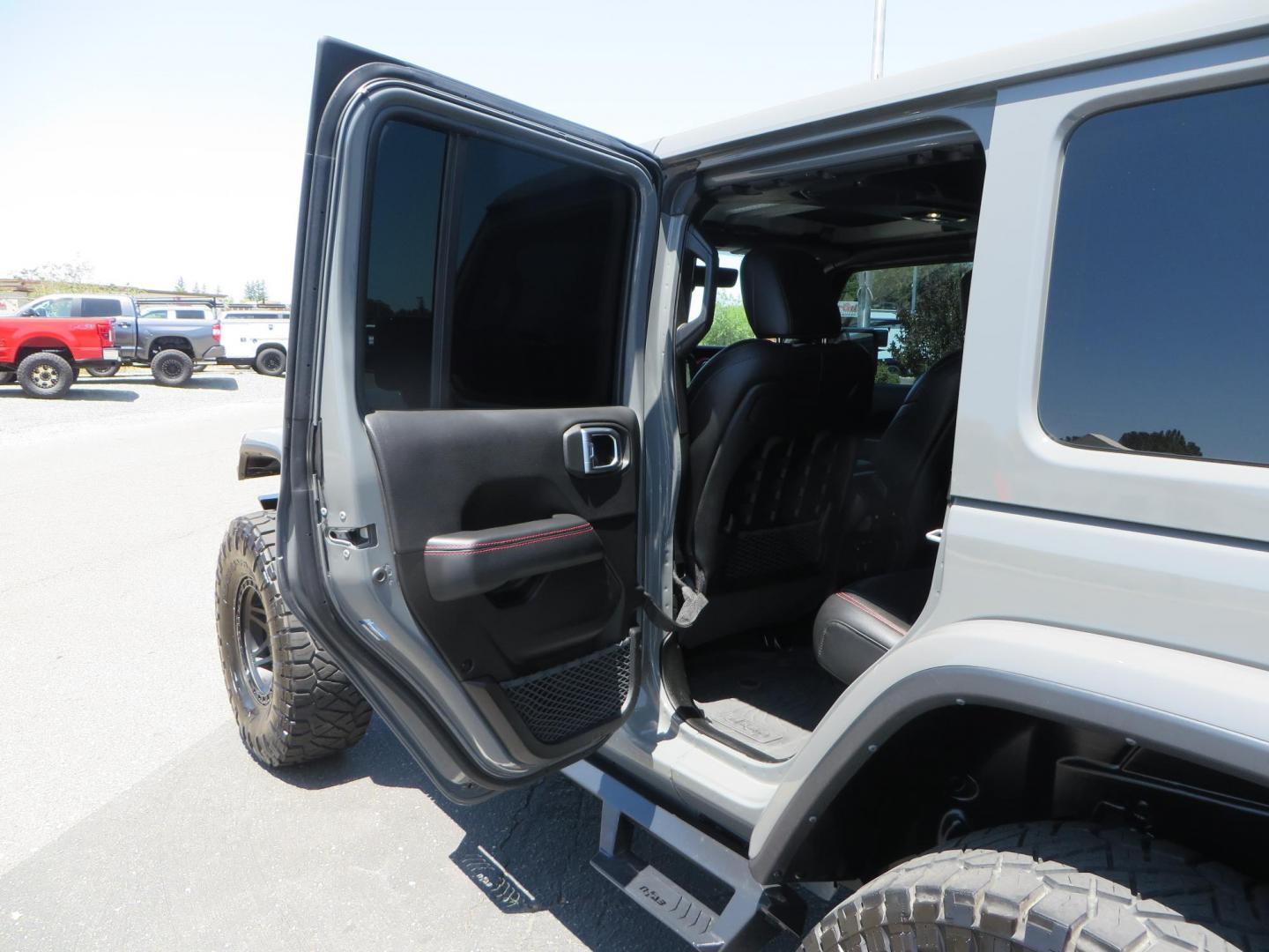 2023 Gray /Black Jeep Wrangler Unlimited Rubicon (1C4HJXFG8PW) with an 3.6L V6 DOHC 24V FFV engine, 6A transmission, located at 2630 Grass Valley Highway, Auburn, CA, 95603, (530) 508-5100, 38.937893, -121.095482 - Features a 3.5" JKS suspension system, Fox shocks, 17" Method Race wheels, 37" Nitto Ridge Grappler tires, N-Fab EPYX running boards, Teraflex HD tire carrier, RC front & rear bumpers with led lights, and window tint. - Photo#41