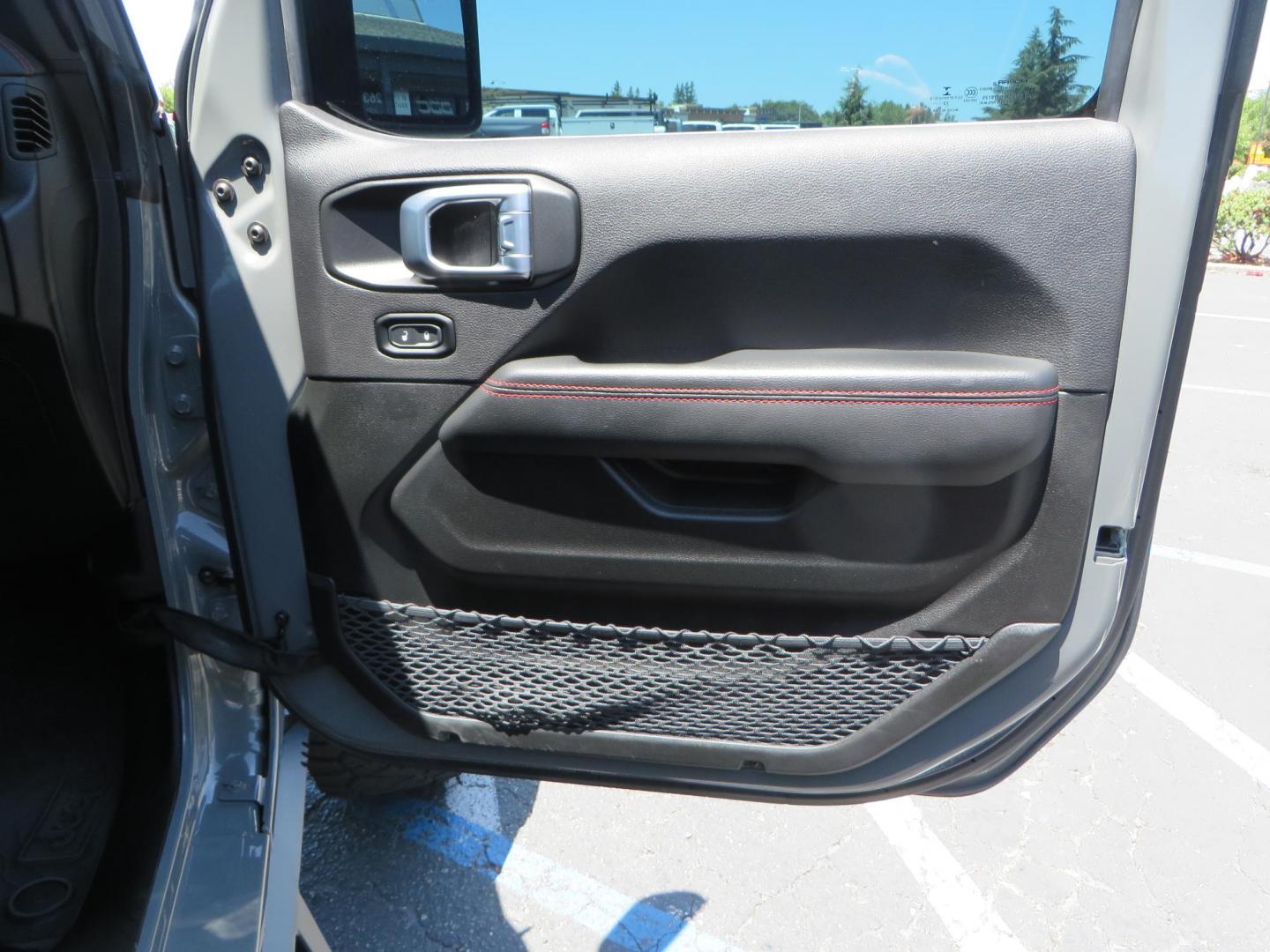 2023 Gray /Black Jeep Wrangler Unlimited Rubicon (1C4HJXFG8PW) with an 3.6L V6 DOHC 24V FFV engine, 6A transmission, located at 2630 Grass Valley Highway, Auburn, CA, 95603, (530) 508-5100, 38.937893, -121.095482 - Features a 3.5" JKS suspension system, Fox shocks, 17" Method Race wheels, 37" Nitto Ridge Grappler tires, N-Fab EPYX running boards, Teraflex HD tire carrier, RC front & rear bumpers with led lights, and window tint. - Photo#49