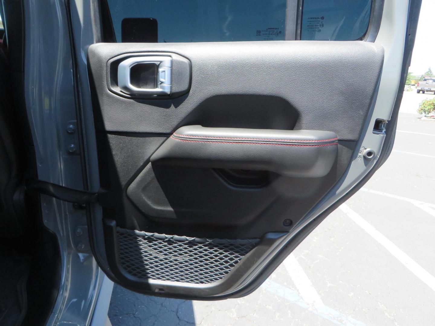 2023 Gray /Black Jeep Wrangler Unlimited Rubicon (1C4HJXFG8PW) with an 3.6L V6 DOHC 24V FFV engine, 6A transmission, located at 2630 Grass Valley Highway, Auburn, CA, 95603, (530) 508-5100, 38.937893, -121.095482 - Features a 3.5" JKS suspension system, Fox shocks, 17" Method Race wheels, 37" Nitto Ridge Grappler tires, N-Fab EPYX running boards, Teraflex HD tire carrier, RC front & rear bumpers with led lights, and window tint. - Photo#56