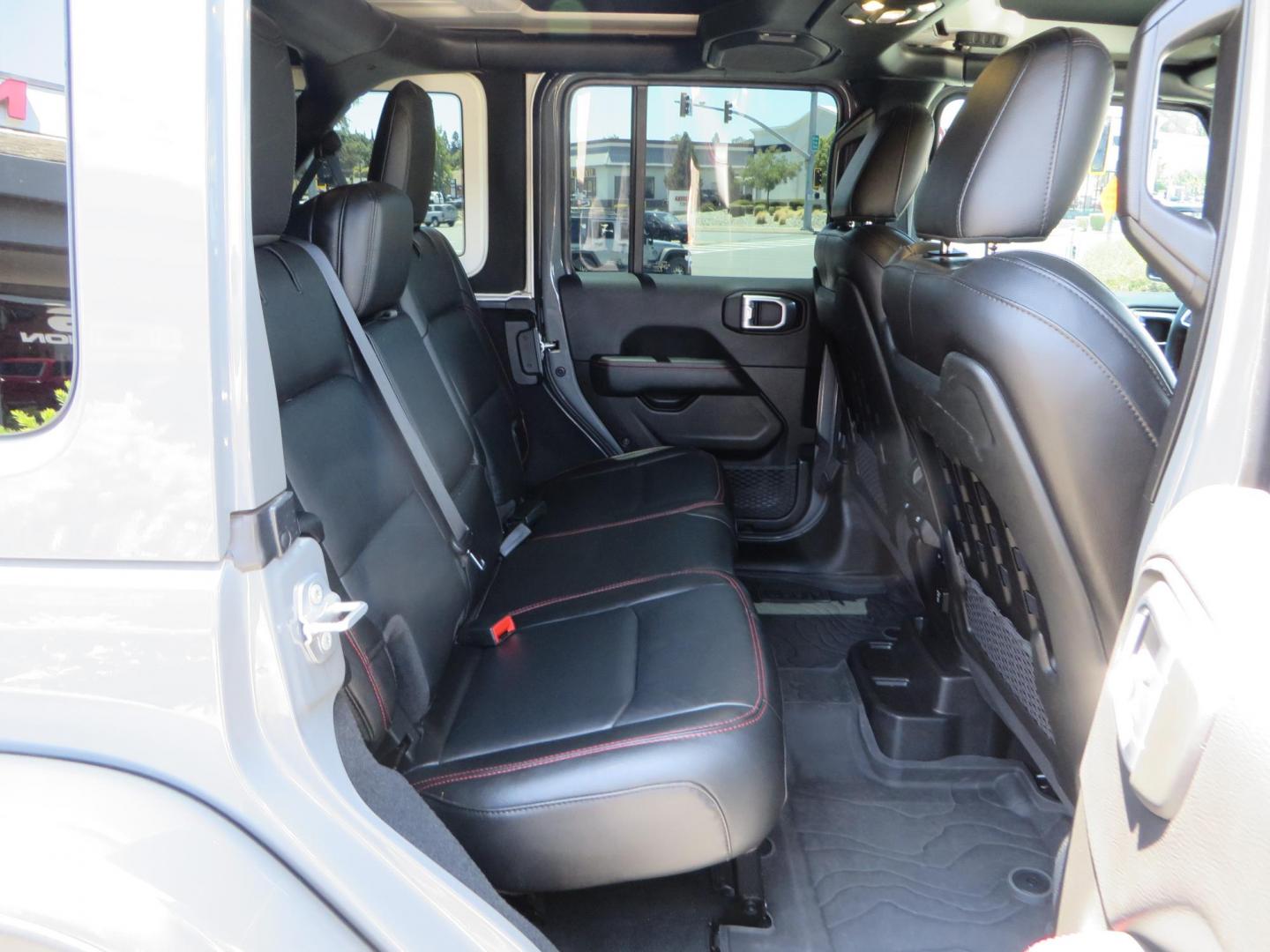 2023 Gray /Black Jeep Wrangler Unlimited Rubicon (1C4HJXFG8PW) with an 3.6L V6 DOHC 24V FFV engine, 6A transmission, located at 2630 Grass Valley Highway, Auburn, CA, 95603, (530) 508-5100, 38.937893, -121.095482 - Features a 3.5" JKS suspension system, Fox shocks, 17" Method Race wheels, 37" Nitto Ridge Grappler tires, N-Fab EPYX running boards, Teraflex HD tire carrier, RC front & rear bumpers with led lights, and window tint. - Photo#57