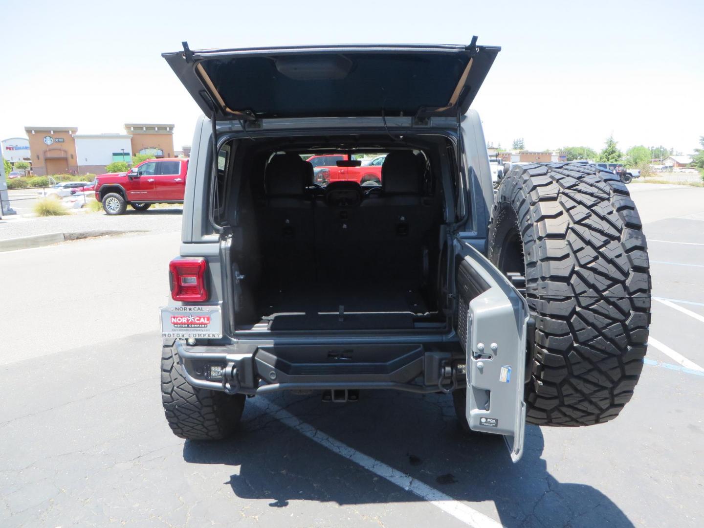 2023 Gray /Black Jeep Wrangler Unlimited Rubicon (1C4HJXFG8PW) with an 3.6L V6 DOHC 24V FFV engine, 6A transmission, located at 2630 Grass Valley Highway, Auburn, CA, 95603, (530) 508-5100, 38.937893, -121.095482 - Features a 3.5" JKS suspension system, Fox shocks, 17" Method Race wheels, 37" Nitto Ridge Grappler tires, N-Fab EPYX running boards, Teraflex HD tire carrier, RC front & rear bumpers with led lights, and window tint. - Photo#62