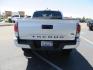2021 White Toyota Tacoma SR5 Double Cab V6 6AT 4WD (3TYCZ5AN8MT) with an 3.5L V6 DOHC 24V engine, 6A transmission, located at 2630 Grass Valley Highway, Auburn, CA, 95603, (530) 508-5100, 38.937893, -121.095482 - Leveled Tacoma sitting on 18" Fuel wheels, Toyo RT tires, Bakflip bed cover, and window tint. - Photo#5
