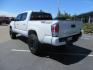 2021 White Toyota Tacoma SR5 Double Cab V6 6AT 4WD (3TYCZ5AN8MT) with an 3.5L V6 DOHC 24V engine, 6A transmission, located at 2630 Grass Valley Highway, Auburn, CA, 95603, (530) 508-5100, 38.937893, -121.095482 - Leveled Tacoma sitting on 18" Fuel wheels, Toyo RT tires, Bakflip bed cover, and window tint. - Photo#6