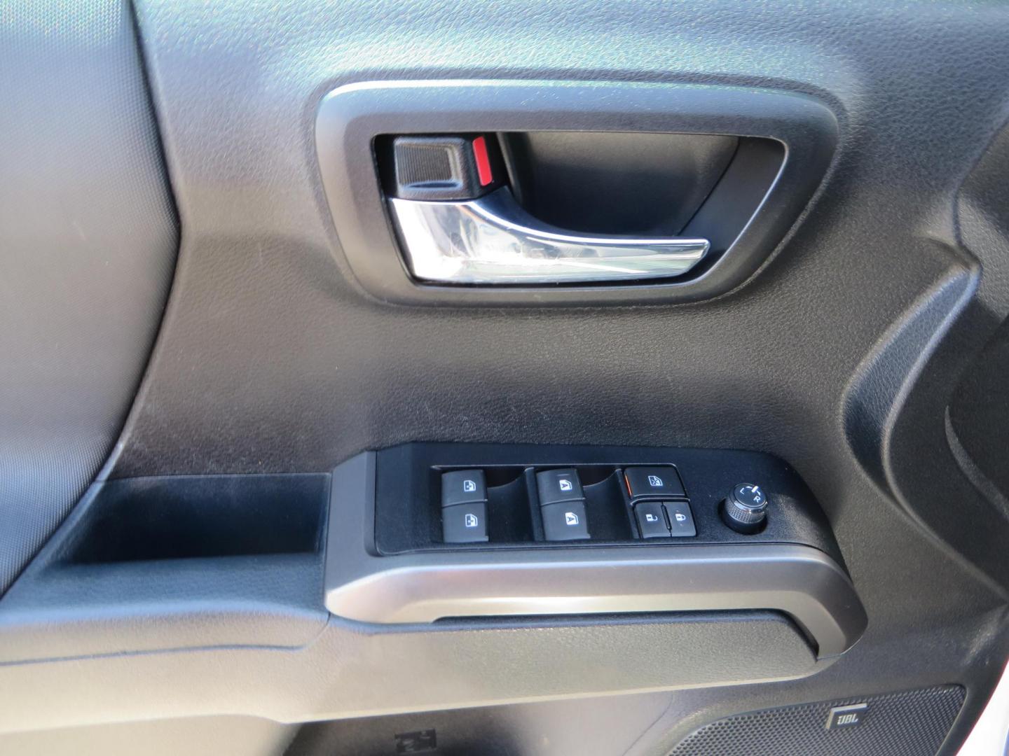 2021 White Toyota Tacoma SR5 Double Cab V6 6AT 4WD (3TYCZ5AN8MT) with an 3.5L V6 DOHC 24V engine, 6A transmission, located at 2630 Grass Valley Highway, Auburn, CA, 95603, (530) 508-5100, 38.937893, -121.095482 - Leveled Tacoma sitting on 18" Fuel wheels, Toyo RT tires, Bakflip bed cover, and window tint. - Photo#15
