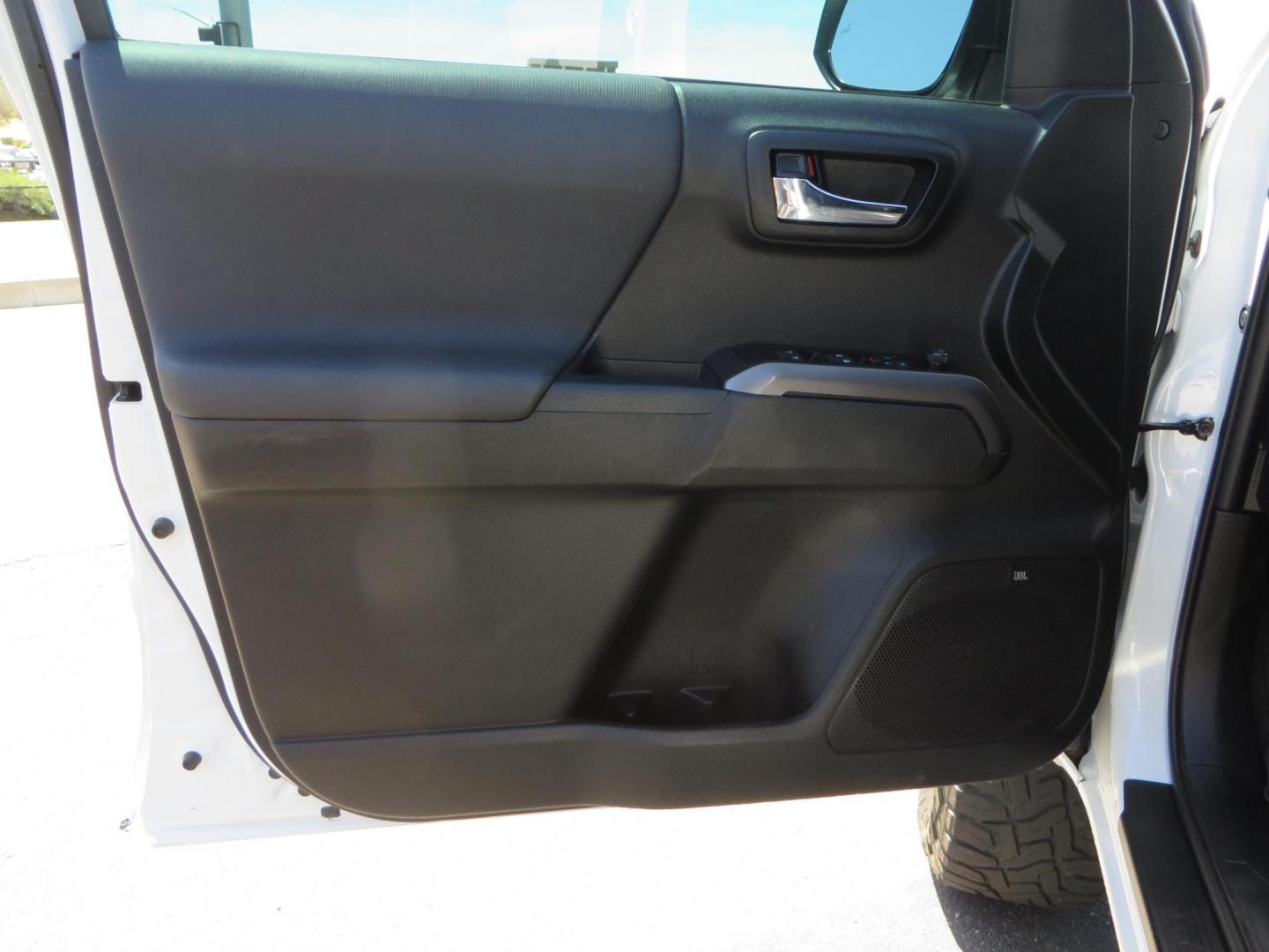 2021 White Toyota Tacoma SR5 Double Cab V6 6AT 4WD (3TYCZ5AN8MT) with an 3.5L V6 DOHC 24V engine, 6A transmission, located at 2630 Grass Valley Highway, Auburn, CA, 95603, (530) 508-5100, 38.937893, -121.095482 - Leveled Tacoma sitting on 18" Fuel wheels, Toyo RT tires, Bakflip bed cover, and window tint. - Photo#14