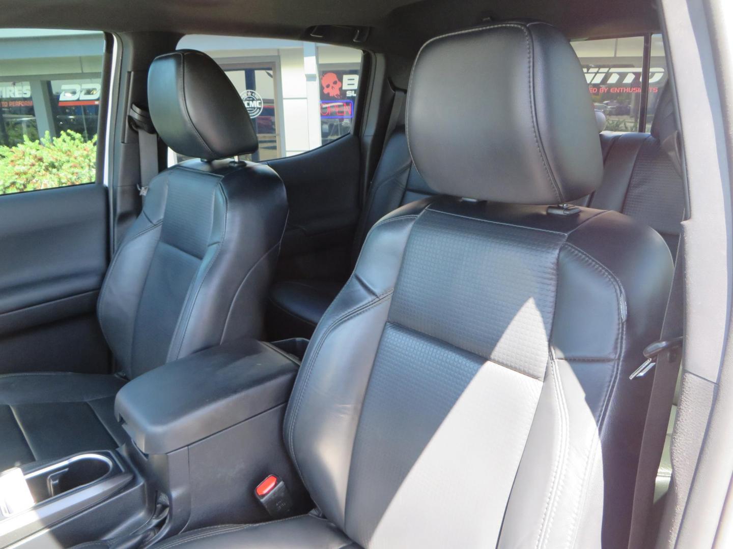 2021 White Toyota Tacoma SR5 Double Cab V6 6AT 4WD (3TYCZ5AN8MT) with an 3.5L V6 DOHC 24V engine, 6A transmission, located at 2630 Grass Valley Highway, Auburn, CA, 95603, (530) 508-5100, 38.937893, -121.095482 - Leveled Tacoma sitting on 18" Fuel wheels, Toyo RT tires, Bakflip bed cover, and window tint. - Photo#18
