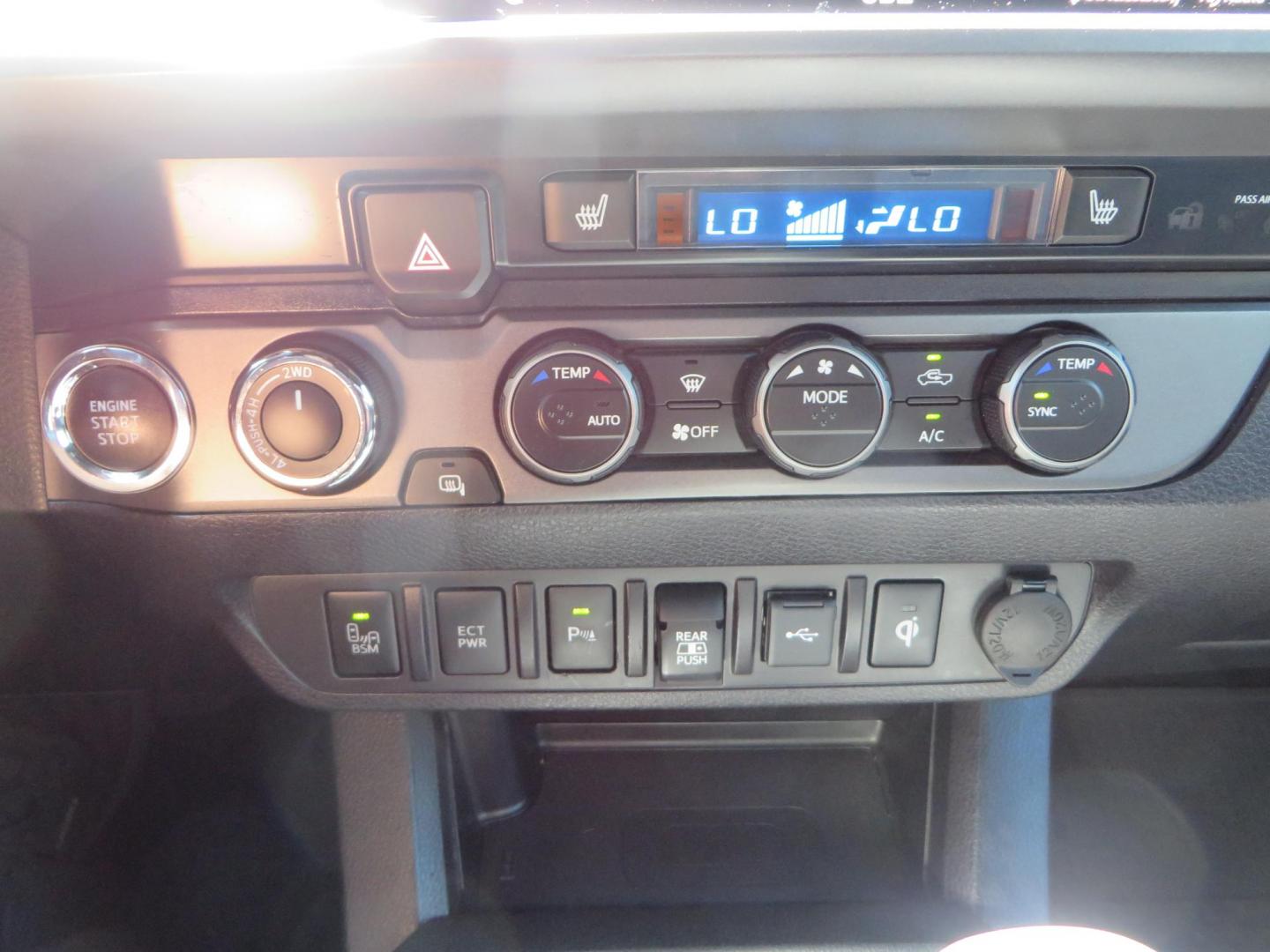 2021 White Toyota Tacoma SR5 Double Cab V6 6AT 4WD (3TYCZ5AN8MT) with an 3.5L V6 DOHC 24V engine, 6A transmission, located at 2630 Grass Valley Highway, Auburn, CA, 95603, (530) 508-5100, 38.937893, -121.095482 - Leveled Tacoma sitting on 18" Fuel wheels, Toyo RT tires, Bakflip bed cover, and window tint. - Photo#26