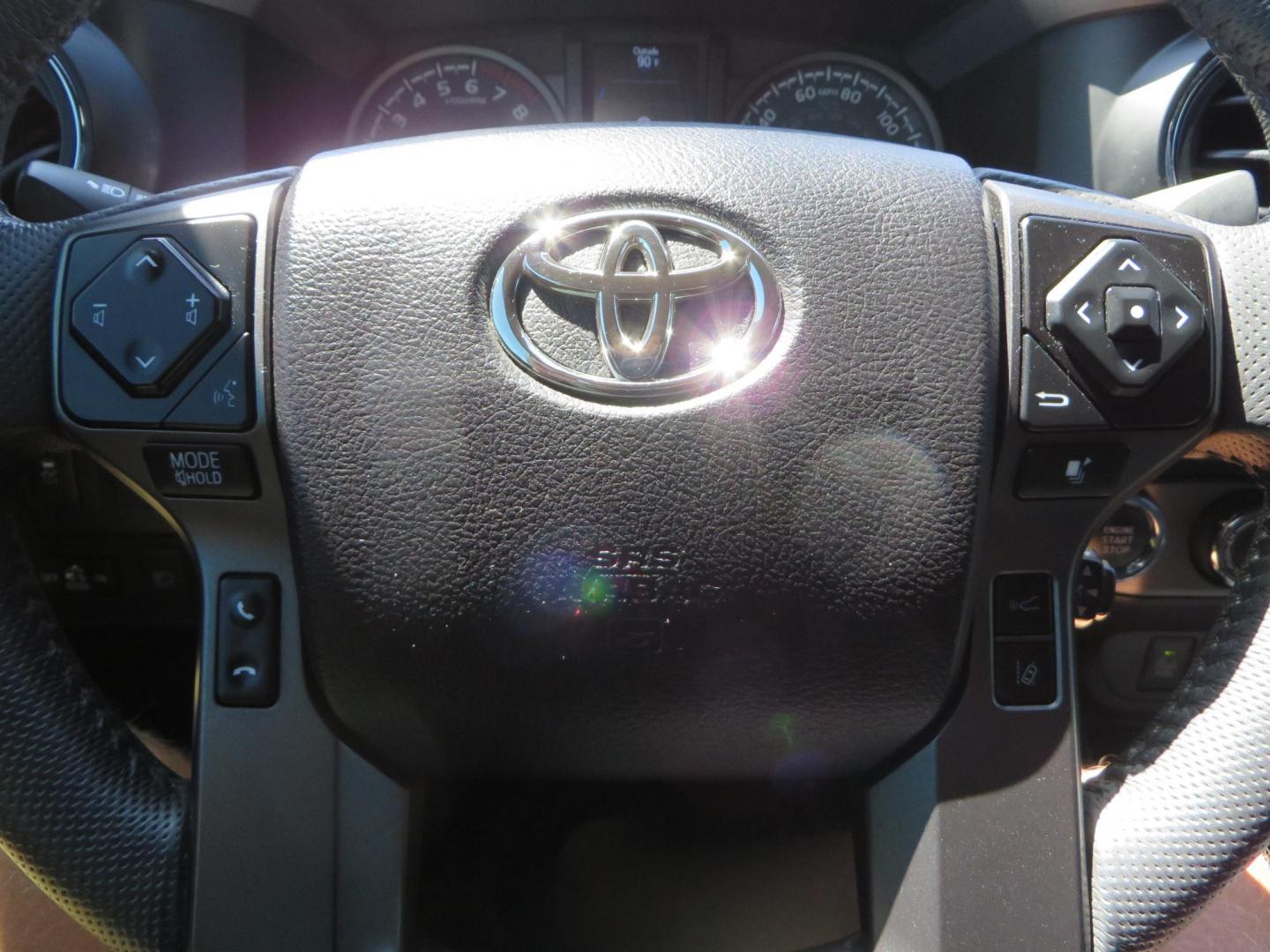 2021 White Toyota Tacoma SR5 Double Cab V6 6AT 4WD (3TYCZ5AN8MT) with an 3.5L V6 DOHC 24V engine, 6A transmission, located at 2630 Grass Valley Highway, Auburn, CA, 95603, (530) 508-5100, 38.937893, -121.095482 - Leveled Tacoma sitting on 18" Fuel wheels, Toyo RT tires, Bakflip bed cover, and window tint. - Photo#31