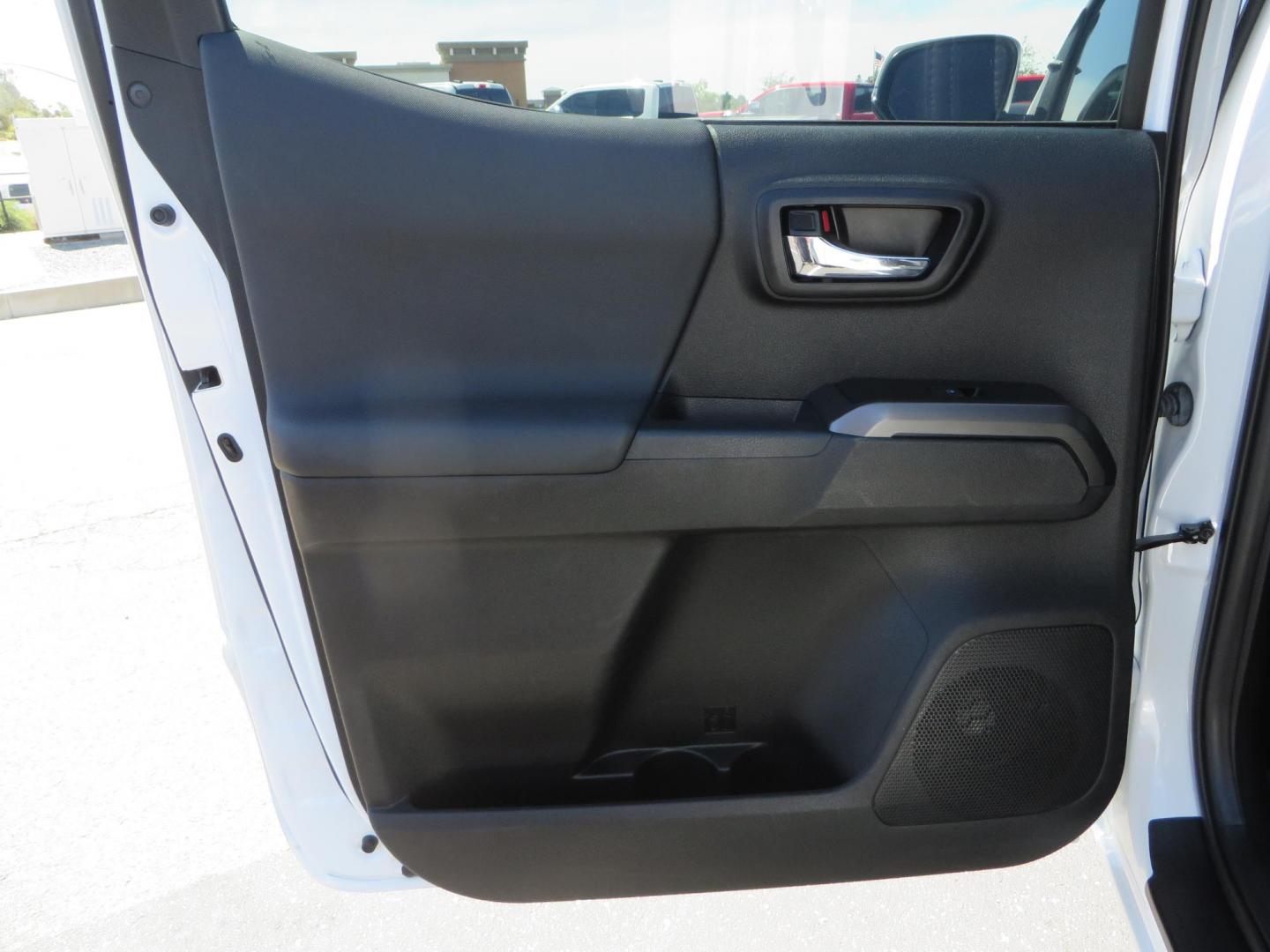2021 White Toyota Tacoma SR5 Double Cab V6 6AT 4WD (3TYCZ5AN8MT) with an 3.5L V6 DOHC 24V engine, 6A transmission, located at 2630 Grass Valley Highway, Auburn, CA, 95603, (530) 508-5100, 38.937893, -121.095482 - Leveled Tacoma sitting on 18" Fuel wheels, Toyo RT tires, Bakflip bed cover, and window tint. - Photo#35