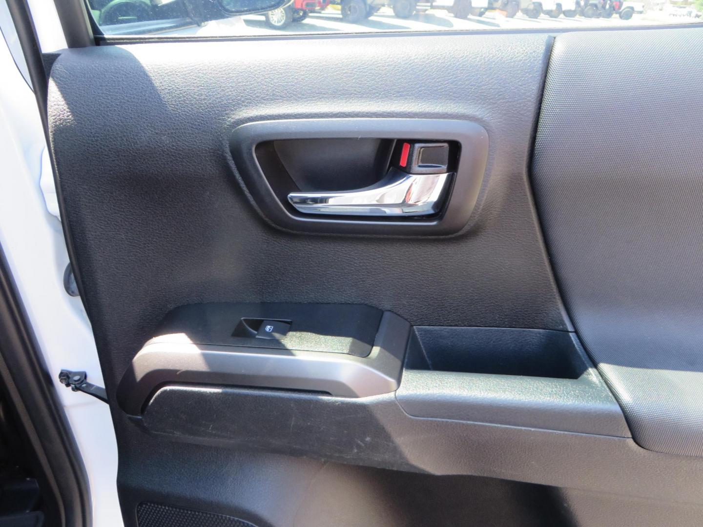 2021 White Toyota Tacoma SR5 Double Cab V6 6AT 4WD (3TYCZ5AN8MT) with an 3.5L V6 DOHC 24V engine, 6A transmission, located at 2630 Grass Valley Highway, Auburn, CA, 95603, (530) 508-5100, 38.937893, -121.095482 - Leveled Tacoma sitting on 18" Fuel wheels, Toyo RT tires, Bakflip bed cover, and window tint. - Photo#50