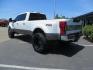 2021 White Ford F-450 SD King Ranch Crew Cab DRW 4WD (1FT8W4DT6ME) with an 6.7L V8 OHV 16V DIESEL engine, 6A transmission, located at 2630 Grass Valley Highway, Auburn, CA, 95603, (530) 508-5100, 38.937893, -121.095482 - Must see F450 King Ranch sitting on 37" Nitto Ridge Grappler tires wrapped around 22" American Force wheels, 2.5" King Remote reservoir Coilovers, King 2.5 adjustable shocks, King dual steering stabilizers, and window tint. - Photo#6