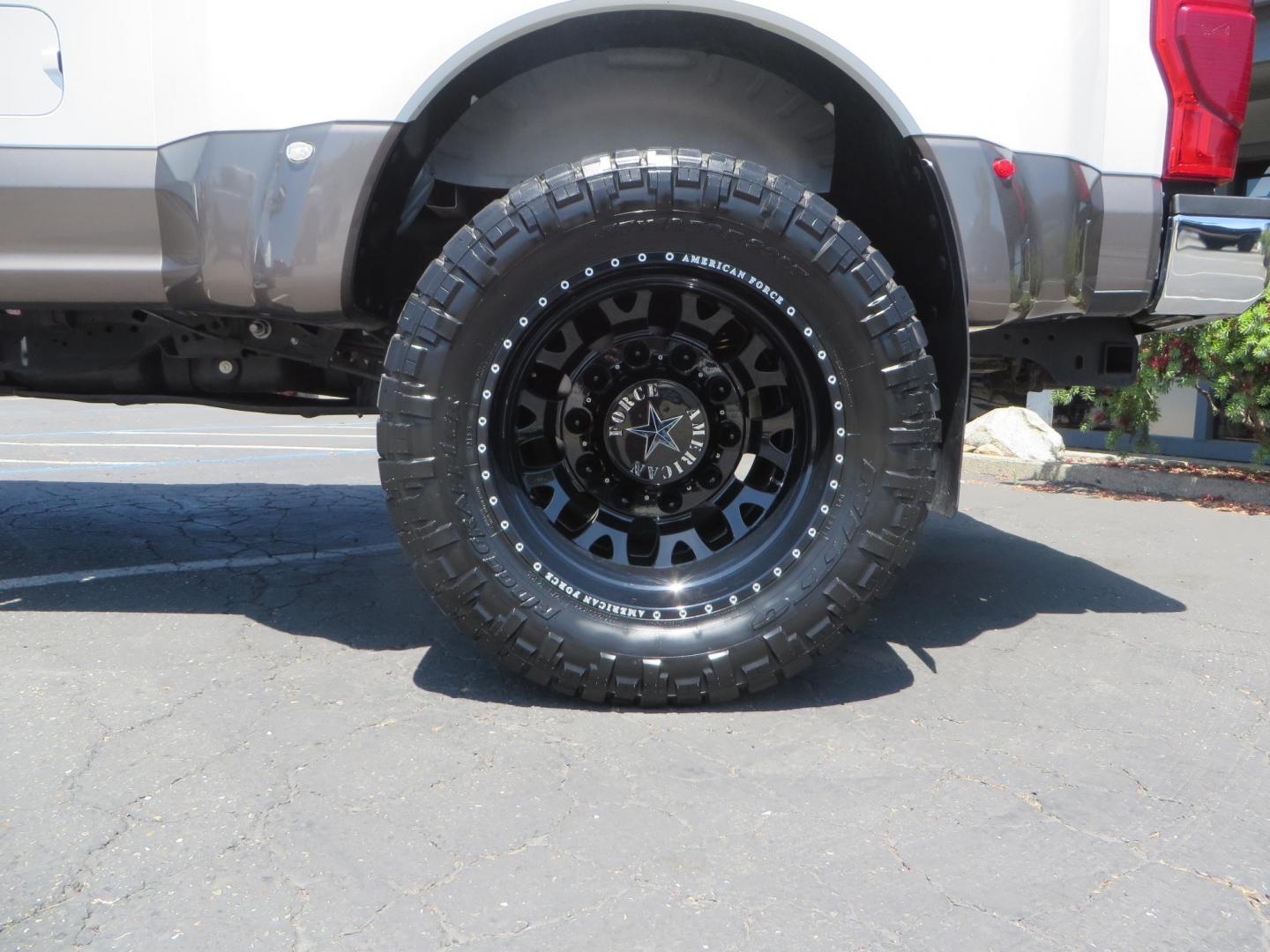 2021 White Ford F-450 SD King Ranch Crew Cab DRW 4WD (1FT8W4DT6ME) with an 6.7L V8 OHV 16V DIESEL engine, 6A transmission, located at 2630 Grass Valley Highway, Auburn, CA, 95603, (530) 508-5100, 38.937893, -121.095482 - Must see F450 King Ranch sitting on 37" Nitto Ridge Grappler tires wrapped around 22" American Force wheels, 2.5" King Remote reservoir Coilovers, King 2.5 adjustable shocks, King dual steering stabilizers, and window tint. - Photo#10