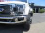 2021 White Ford F-450 SD King Ranch Crew Cab DRW 4WD (1FT8W4DT6ME) with an 6.7L V8 OHV 16V DIESEL engine, 6A transmission, located at 2630 Grass Valley Highway, Auburn, CA, 95603, (530) 508-5100, 38.937893, -121.095482 - Must see F450 King Ranch sitting on 37" Nitto Ridge Grappler tires wrapped around 22" American Force wheels, 2.5" King Remote reservoir Coilovers, King 2.5 adjustable shocks, King dual steering stabilizers, and window tint. - Photo#11