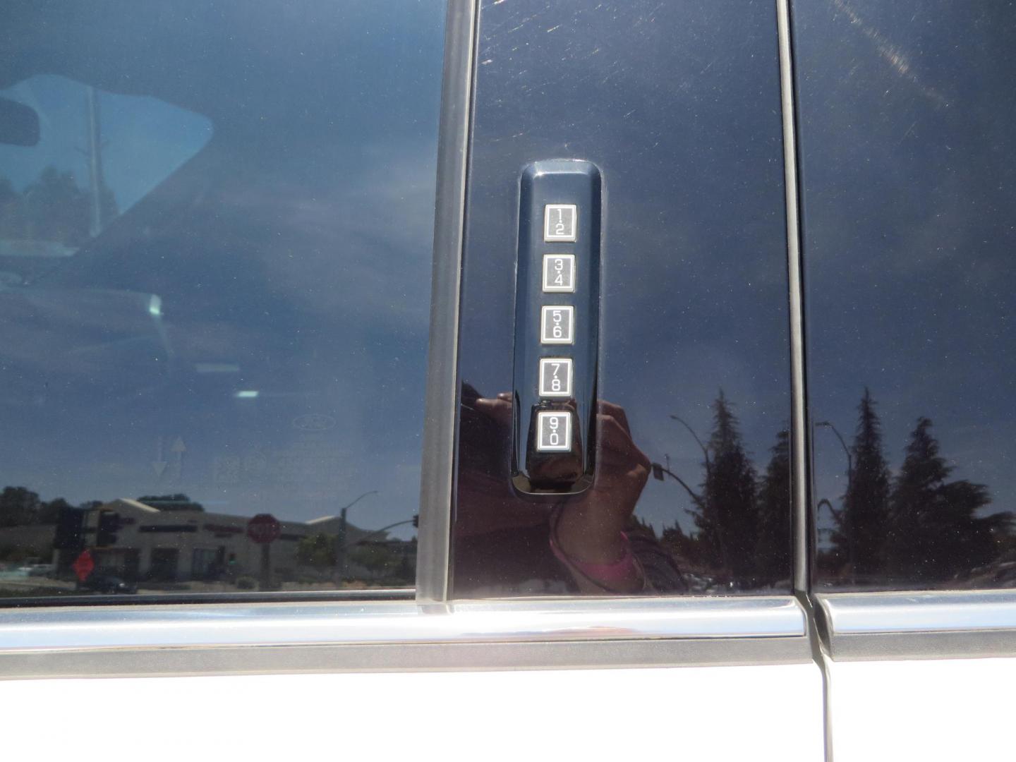 2021 White Ford F-450 SD King Ranch Crew Cab DRW 4WD (1FT8W4DT6ME) with an 6.7L V8 OHV 16V DIESEL engine, 6A transmission, located at 2630 Grass Valley Highway, Auburn, CA, 95603, (530) 508-5100, 38.937893, -121.095482 - Must see F450 King Ranch sitting on 37" Nitto Ridge Grappler tires wrapped around 22" American Force wheels, 2.5" King Remote reservoir Coilovers, King 2.5 adjustable shocks, King dual steering stabilizers, and window tint. - Photo#23