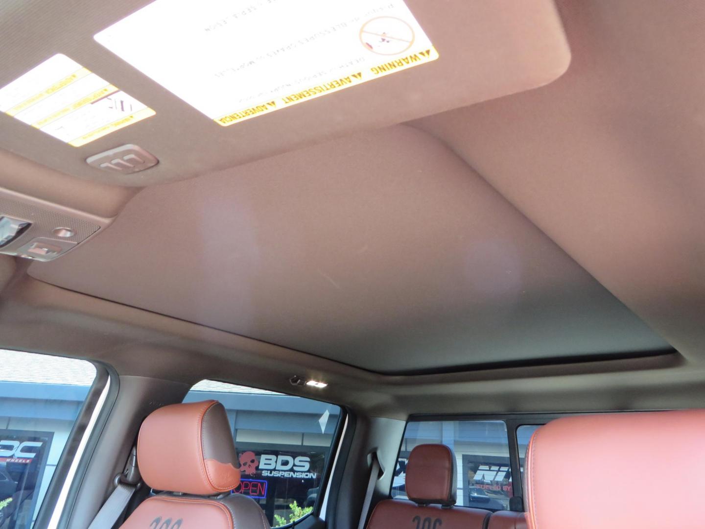 2021 White Ford F-450 SD King Ranch Crew Cab DRW 4WD (1FT8W4DT6ME) with an 6.7L V8 OHV 16V DIESEL engine, 6A transmission, located at 2630 Grass Valley Highway, Auburn, CA, 95603, (530) 508-5100, 38.937893, -121.095482 - Must see F450 King Ranch sitting on 37" Nitto Ridge Grappler tires wrapped around 22" American Force wheels, 2.5" King Remote reservoir Coilovers, King 2.5 adjustable shocks, King dual steering stabilizers, and window tint. - Photo#31