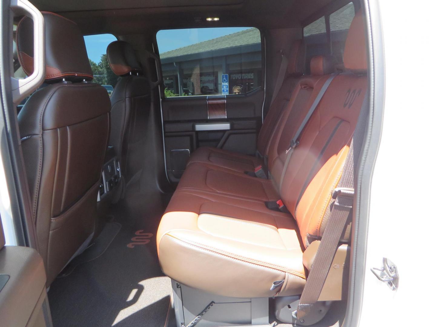 2021 White Ford F-450 SD King Ranch Crew Cab DRW 4WD (1FT8W4DT6ME) with an 6.7L V8 OHV 16V DIESEL engine, 6A transmission, located at 2630 Grass Valley Highway, Auburn, CA, 95603, (530) 508-5100, 38.937893, -121.095482 - Must see F450 King Ranch sitting on 37" Nitto Ridge Grappler tires wrapped around 22" American Force wheels, 2.5" King Remote reservoir Coilovers, King 2.5 adjustable shocks, King dual steering stabilizers, and window tint. - Photo#57