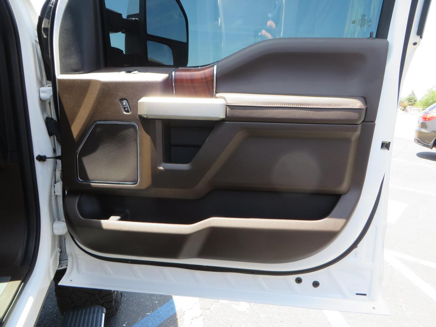 2021 White Ford F-450 SD King Ranch Crew Cab DRW 4WD (1FT8W4DT6ME) with an 6.7L V8 OHV 16V DIESEL engine, 6A transmission, located at 2630 Grass Valley Highway, Auburn, CA, 95603, (530) 508-5100, 38.937893, -121.095482 - Must see F450 King Ranch sitting on 37" Nitto Ridge Grappler tires wrapped around 22" American Force wheels, 2.5" King Remote reservoir Coilovers, King 2.5 adjustable shocks, King dual steering stabilizers, and window tint. - Photo#62